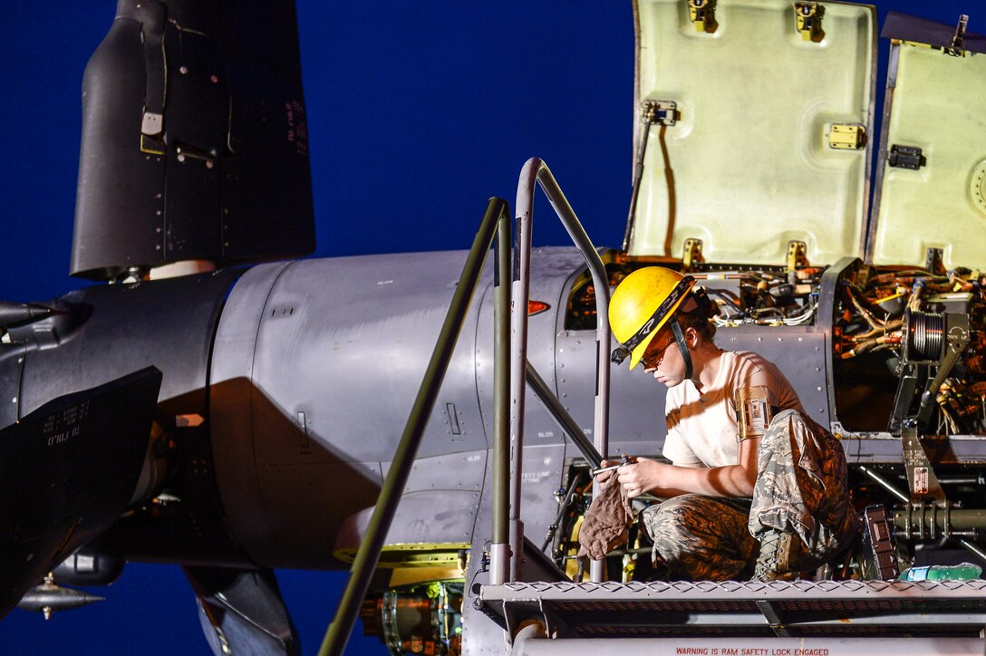 Staff Sgt. Melissa Hopkins, 801st Special Operations Aircraft Maintenance Squadron dedicated crew chief, inspects a CV-22 Osprey engine part on Hurlburt Field, Fla., June 13, 2014. The 801st SOAMXS routinely troubleshoots, repairs, launches and recovers aircraft. (U.S. Air Force photo/Airman 1st Class Jeff Parkinson)