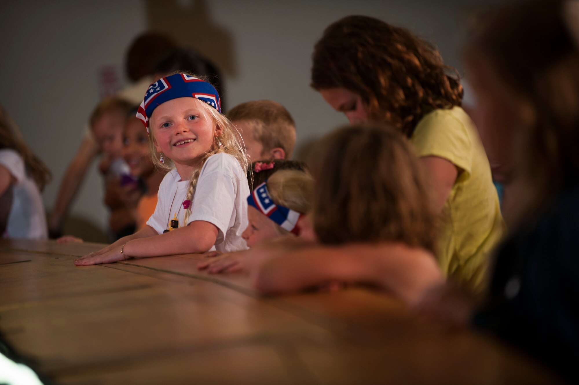 Hundreds of Team Minot family members gathered to watch the Sesame Street USO Experience for Military Families Tour at the Minot Air Force Base theater, June 16-17, 2014. The show, which had four separate viewing times, featured Elmo, Grover, Cookie Monster, Rosita and Katie, who is a military child herself. (U.S. Air Force photo/Airman 1st Class Apryl Hall)