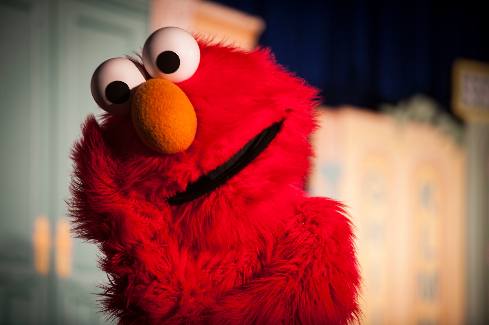 Hundreds of Team Minot family members gathered to watch the Sesame Street USO Experience for Military Families Tour at the Minot Air Force Base theater, June 16-17, 2014. The show, which had four separate viewing times, featured Elmo, Grover, Cookie Monster, Rosita and Katie, who is a military child herself. (U.S. Air Force photo/Airman 1st Class Apryl Hall)