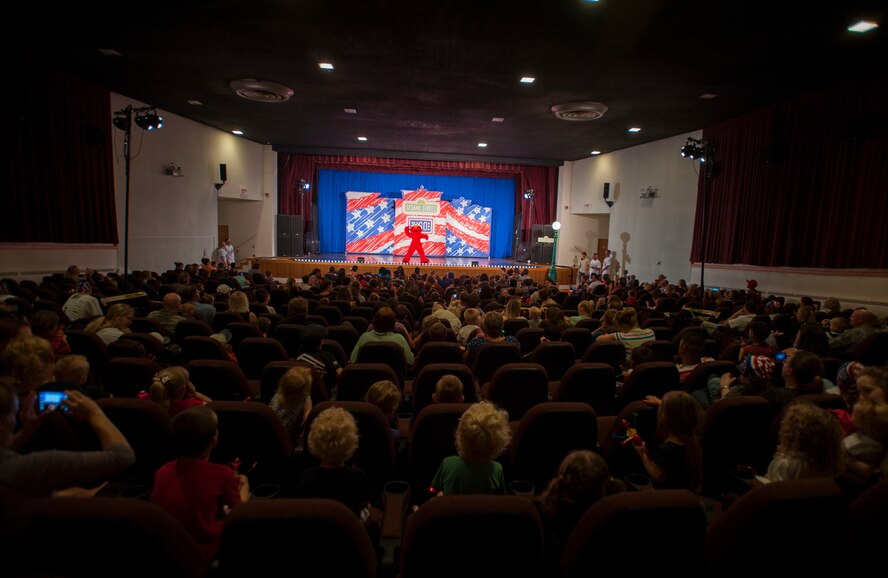 Hundreds of Team Minot family members gathered to watch the Sesame Street USO Experience for Military Families Tour at the Minot Air Force Base theater, June 16-17, 2014. The show, which had four separate viewing times, featured Elmo, Grover, Cookie Monster, Rosita and Katie, who is a military child herself. (U.S. Air Force photo/Airman 1st Class Apryl Hall)
