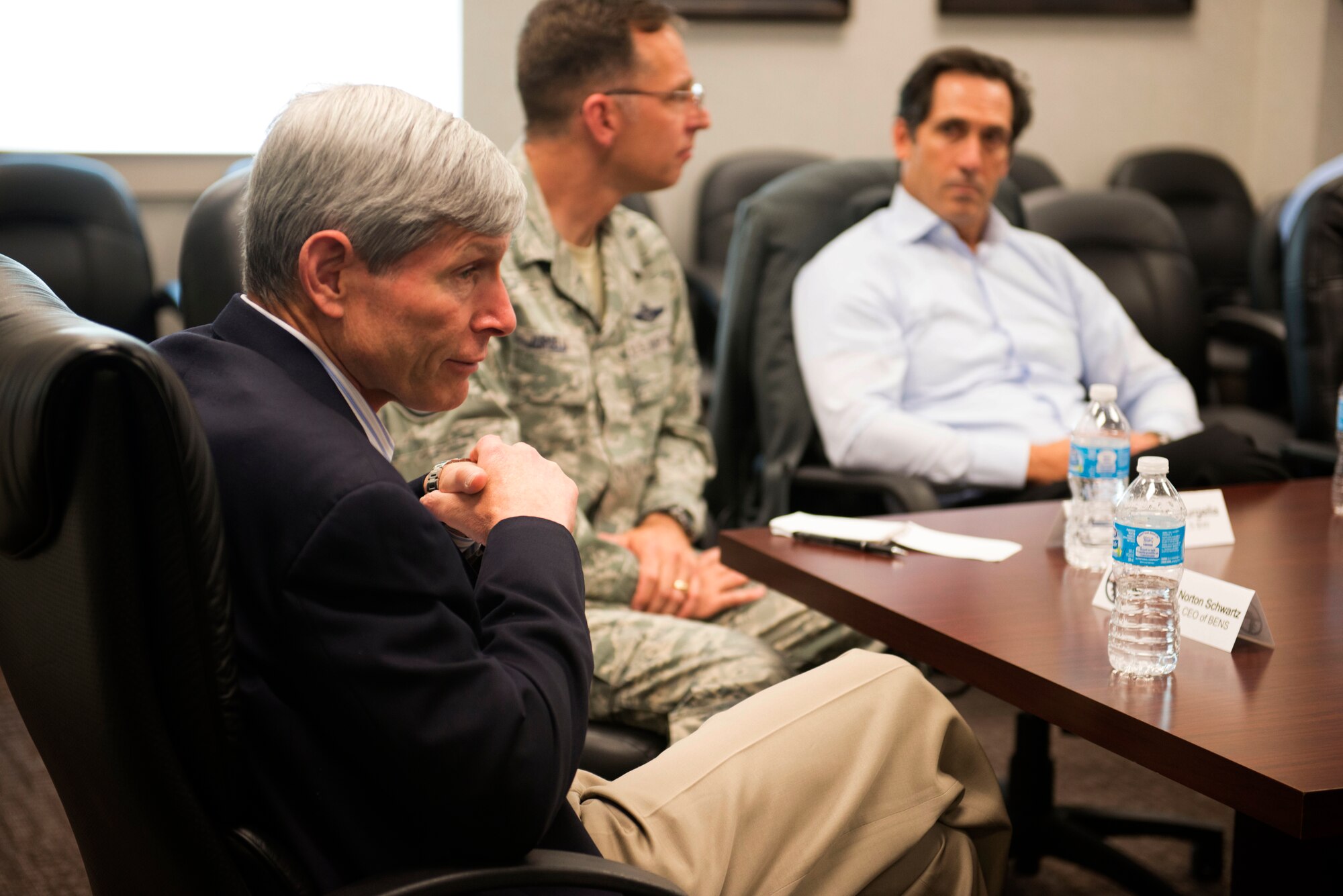 Retired Air Force Gen. Norton Schwartz, president and CEO of the Business Executives for National Security, meets with other BENS members and Airmen at Minot Air Force Base, N.D., June 10, 2014. The discussion consisted of more efficient ways to attract and retain civilian talent in a competitive labor environment. (U.S. Air Force photos/Airman 1st Class Sahara L. Fales)