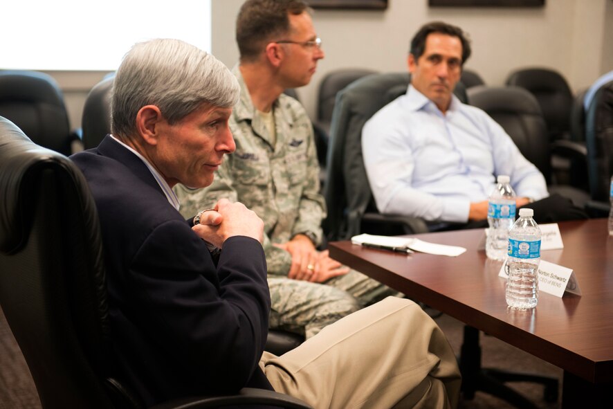 Retired Air Force Gen. Norton Schwartz, president and CEO of the Business Executives for National Security, meets with other BENS members and Airmen at Minot Air Force Base, N.D., June 10, 2014. The discussion consisted of more efficient ways to attract and retain civilian talent in a competitive labor environment. (U.S. Air Force photos/Airman 1st Class Sahara L. Fales)