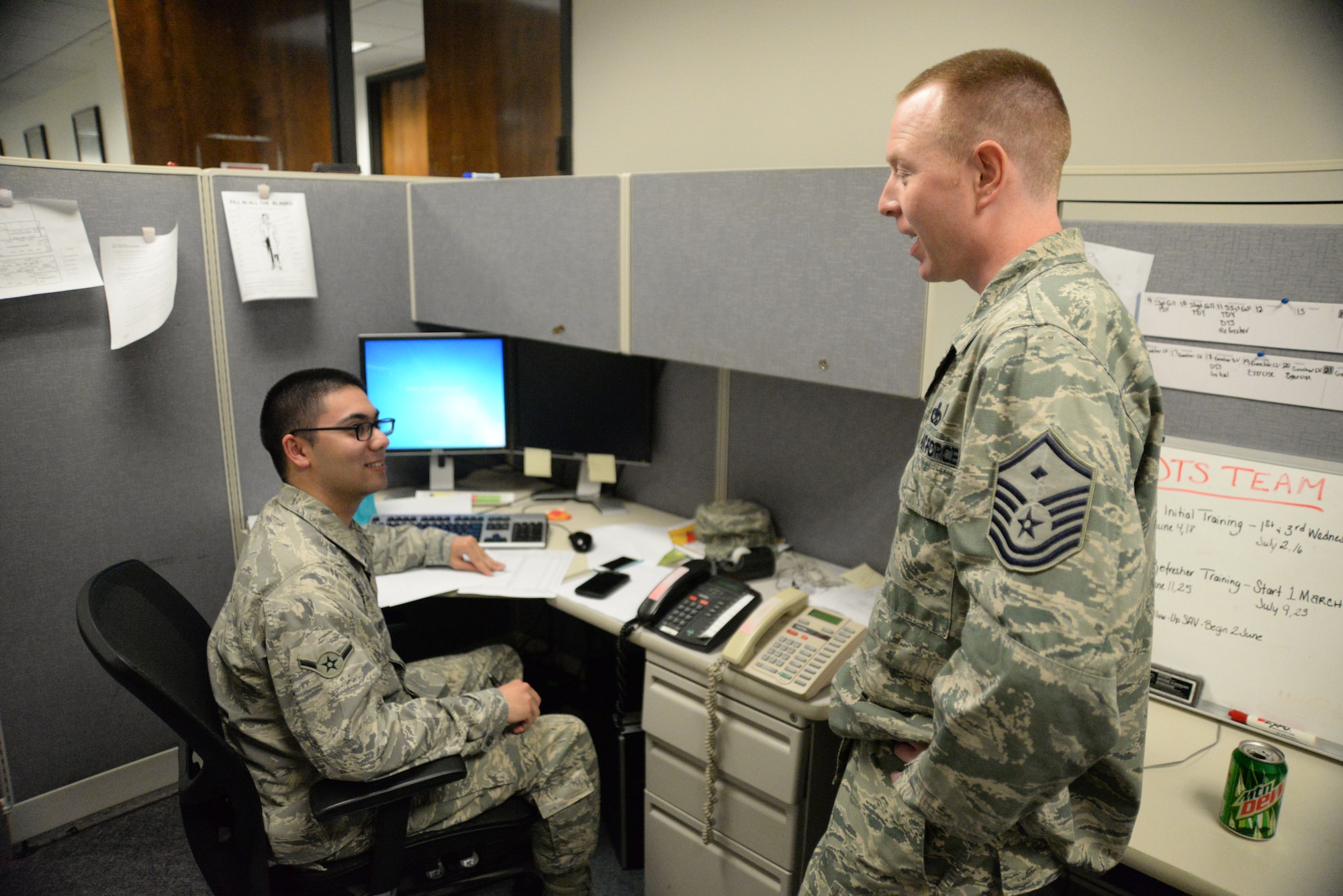 U.S. Air Force Master Sgt. Jeffrey Van Strydonk, 20th Comptroller first sergeant, talks with Airman Alan Potts, 20th Comptroller financial management technician, at Shaw Air Force Base, S.C., June 17, 2014. First sergeants can aid Airman with problems that they may face such as financial problems, work related issues, and or home related problems. (U.S. Air Force photo by Airman 1st Class Michael A. Cossaboom/Released)