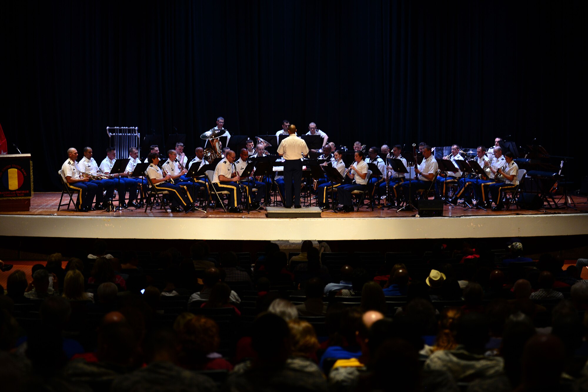 The U.S. Army Training and Doctrine Command Band perform during the 239th Army Birthday concert and streamer ceremony at Fort Eustis, Va., June 12, 2014. The band performed throughout the ceremony, playing songs to follow along with program.  (U.S. Air Force photo by Airman 1st Class Kimberly Nagle/Released) (Photo was cropped, sharpened, color corrected and levels were used.)