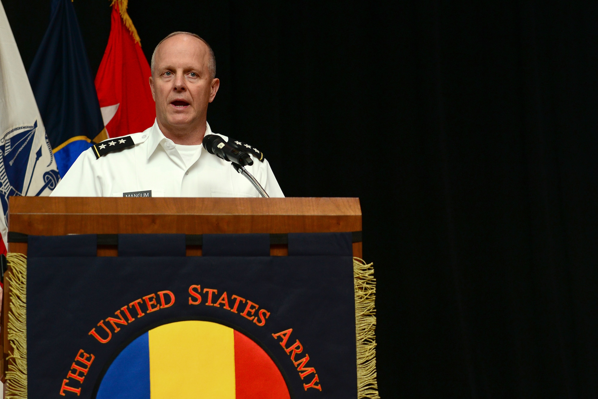 U.S. Army Lt. Gen. Kevin Mangum, U.S. Army Training and Doctrine Command deputy commanding general and chief of staff, hosted the 239th Army Birthday concert and streamer ceremony at Fort Eustis, Va., June 12, 2014. During his remarks, Mangum discussed the importance of remembering the men and women who have answered the nation’s call. (U.S. Air Force photo by Airman 1st Class Kimberly Nagle/Released)