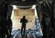 Airmen load a Hardside Expandable Light Air Mobile Shelter, or HELAM, on to a Navy C-130 June 13 in support of Naval exercise “Rim of the Pacific.