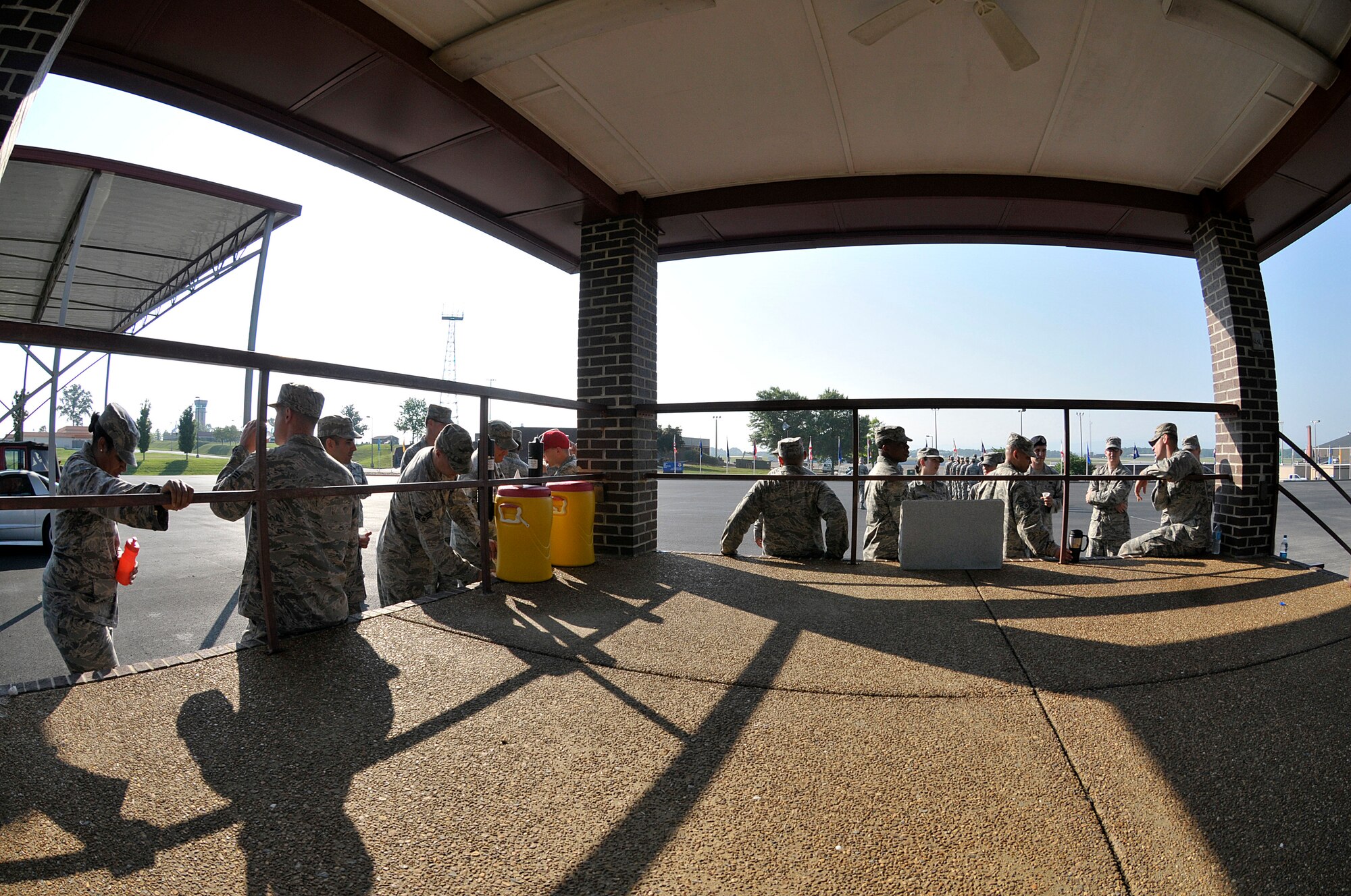 MCGHEE TYSON AIR NATIONAL GUARD BASE, Tenn. - Air National Guard Airmen from across the nation take a water break here June 17, 2014, with the late morning heat index rising on the parade ground of the I.G. Brown Training and Education Center. The Airmen are students in satellite Airman Leadership School and performed their summative evaluation for drill and ceremony. (U.S. Air National Guard photo by Master Sgt. Mike R. Smith/Released)