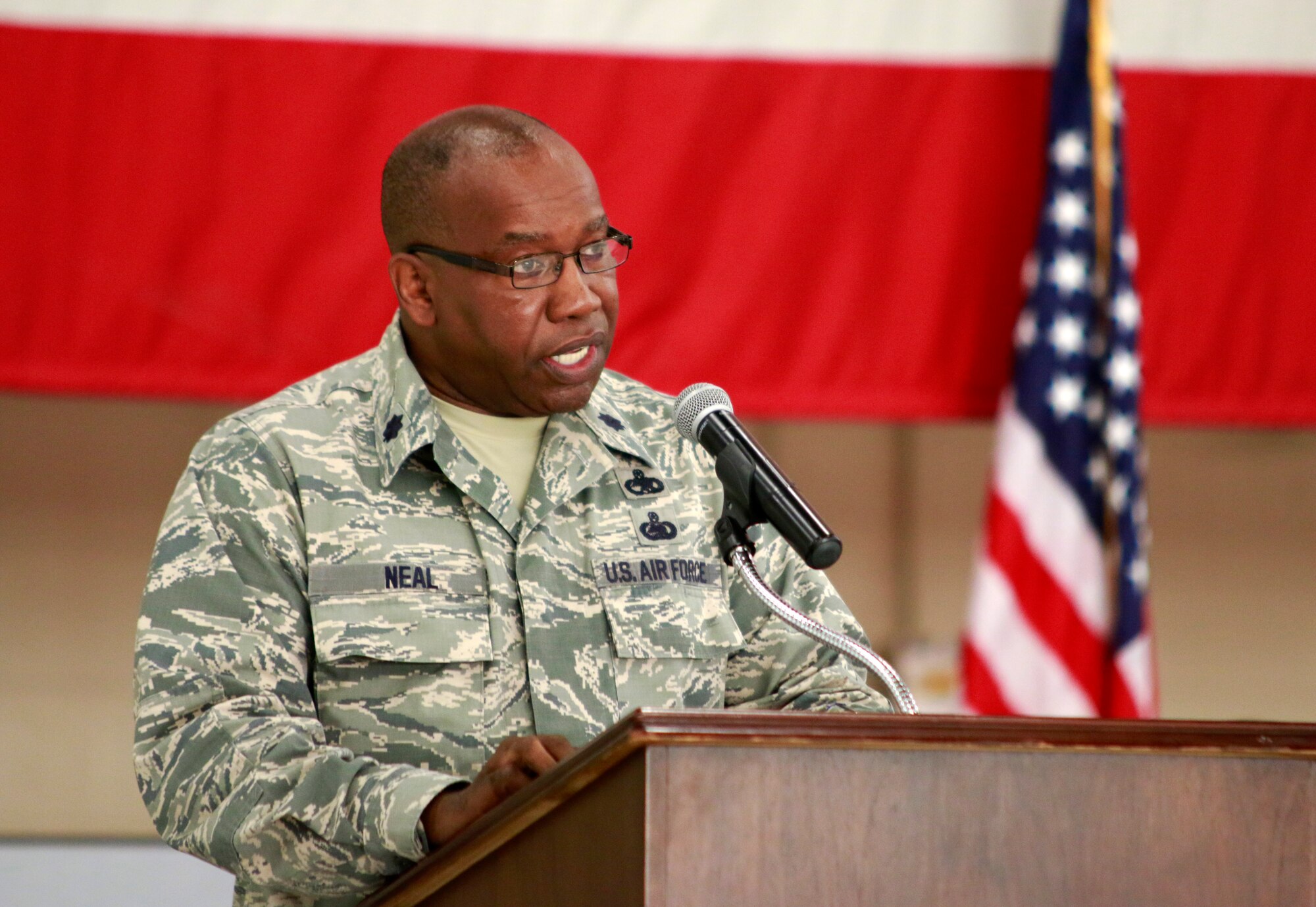 Lt. Col. Anderson Neal, out-going 188th Maintenance Group commander, delivers a speech following the inactivation of the 188th Maintenance Group, 188th Maintenance Squadron, 188th Aircraft Maintenance Squadron and 188th Maintenance Operations Flight during a Conversion Day ceremony held at Ebbing Air National Guard Base, Fort Smith, Arkansas, June 7, 2014. The ceremony recognized the many changes occurring at the wing as a result of its conversion to a remotely piloted aircraft (MQ-9 Reapers) and intelligence, surveillance and reconnaissance mission. The 188th Fighter Wing was redesignated as the 188th Wing during the event. (U.S. Air National Guard photo by Staff Sgt. Matthew Pelkey) 