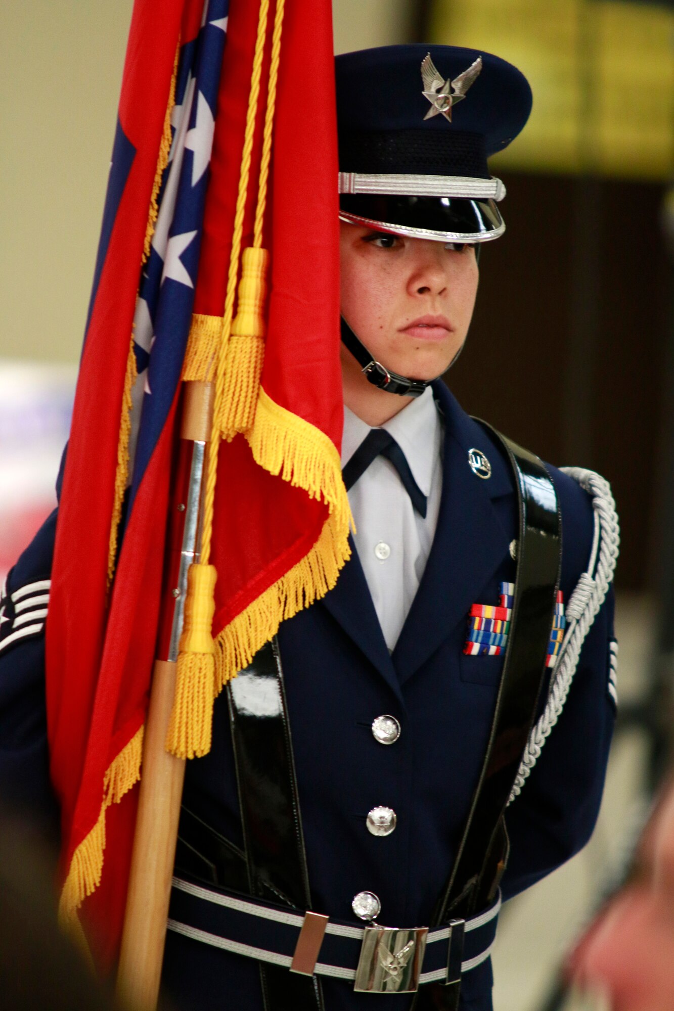 Staff Sgt. Caressa Soriano, 188th Wing Honor Guard, stands at parade rest following the posting of the colors during a Conversion Day ceremony held at Ebbing Air National Guard Base, Fort Smith, Arkansas, June 7, 2014. The ceremony recognized the many changes occurring at the wing as a result of its conversion to a remotely piloted aircraft (MQ-9 Reapers) and intelligence, surveillance and reconnaissance mission. The 188th Fighter Wing was redesignated as the 188th Wing during the event. (U.S. Air National Guard photo by Staff Sgt. Matthew Pelkey) 