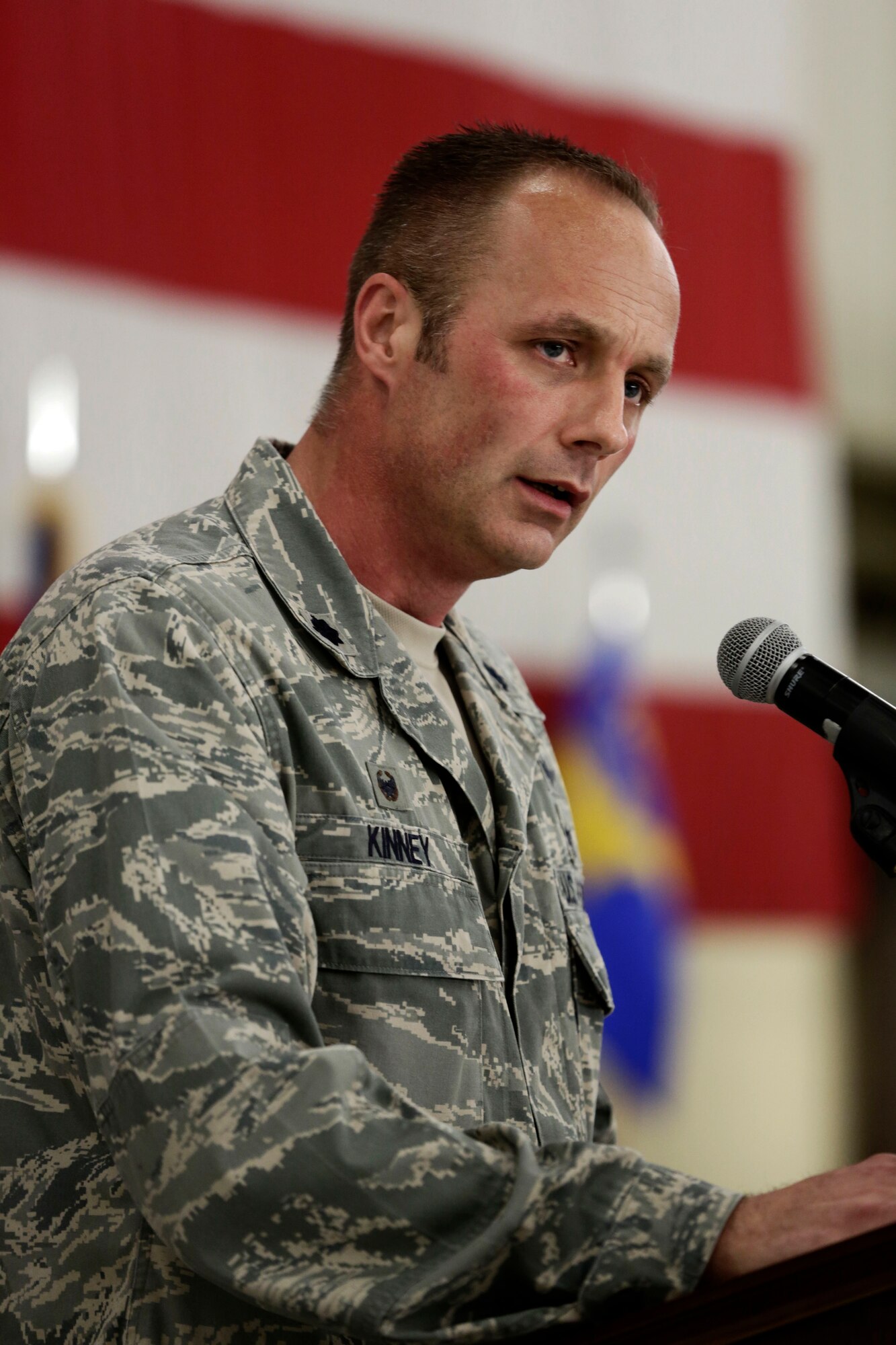 Lt. Col. Robert Kinney, 188th Intelligence, Surveillance and Reconnaissance Group commander, speaks to a packed hangar during a Conversion Day ceremony held at Ebbing Air National Guard Base, Fort Smith, Arkansas, June 7, 2014.  Kinney took command of the newly activated 188th ISR Group during the ceremony, which recognized the many changes occurring at the wing as a result of its conversion to a remotely piloted aircraft (MQ-9 Reapers) and intelligence, surveillance and reconnaissance mission. The 188th Fighter Wing was redesignated as the 188th Wing during the event. (U.S. Air National Guard photo by Master Sgt. Mark Moore)