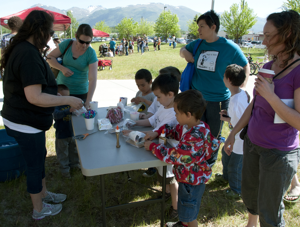JBER library enlists service dogs, ferrets for a “Paws to Read