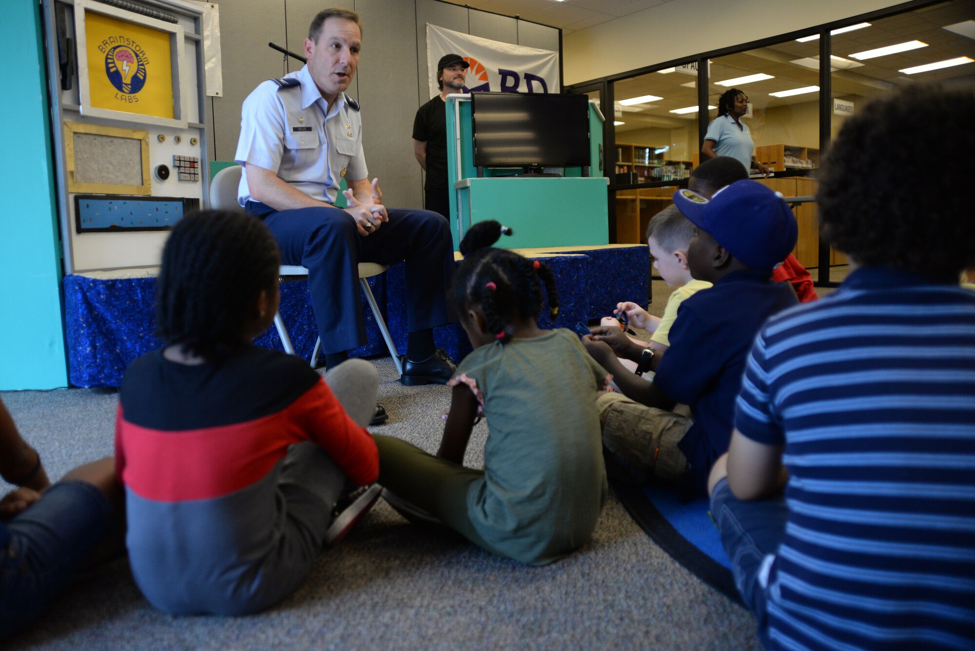 U.S. Air Force Col. Scott Arcuri, 20th Mission Support Group commander, addresses Team Shaw family members of the importance of reading this summer at Shaw Air Force Base, S.C., June 16, 2014. The 20th Force Support Squadron will be hosting a summer reading program that ends July 23. (U.S. Air Force Photo by Airman 1st Class Michael A. Cossaboom/Released)