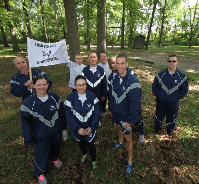 Members of 932nd Maintenance Group's "Team Grumy Cat", pose for a photo after competing in a number of physical activities. In May the 932nd Airlift Wing Maintenance Group participated in a daylong training event focused on building camaraderie, developing leadership skills and physical training. (U.S. Air Force photo by Tech. Sgt. Christopher Parr)  