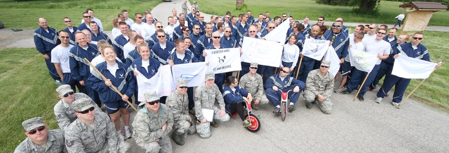 Members of 932nd Maintenance Group pose for  a photo after competing in a number of physical activities.  In May the 932nd Airlift Wing Maintenance Group participated in a daylong training event focused on building camaraderie, developing leadership skills and physical training. (U.S. Air Force photo by Tech. Sgt. Christopher Parr)  