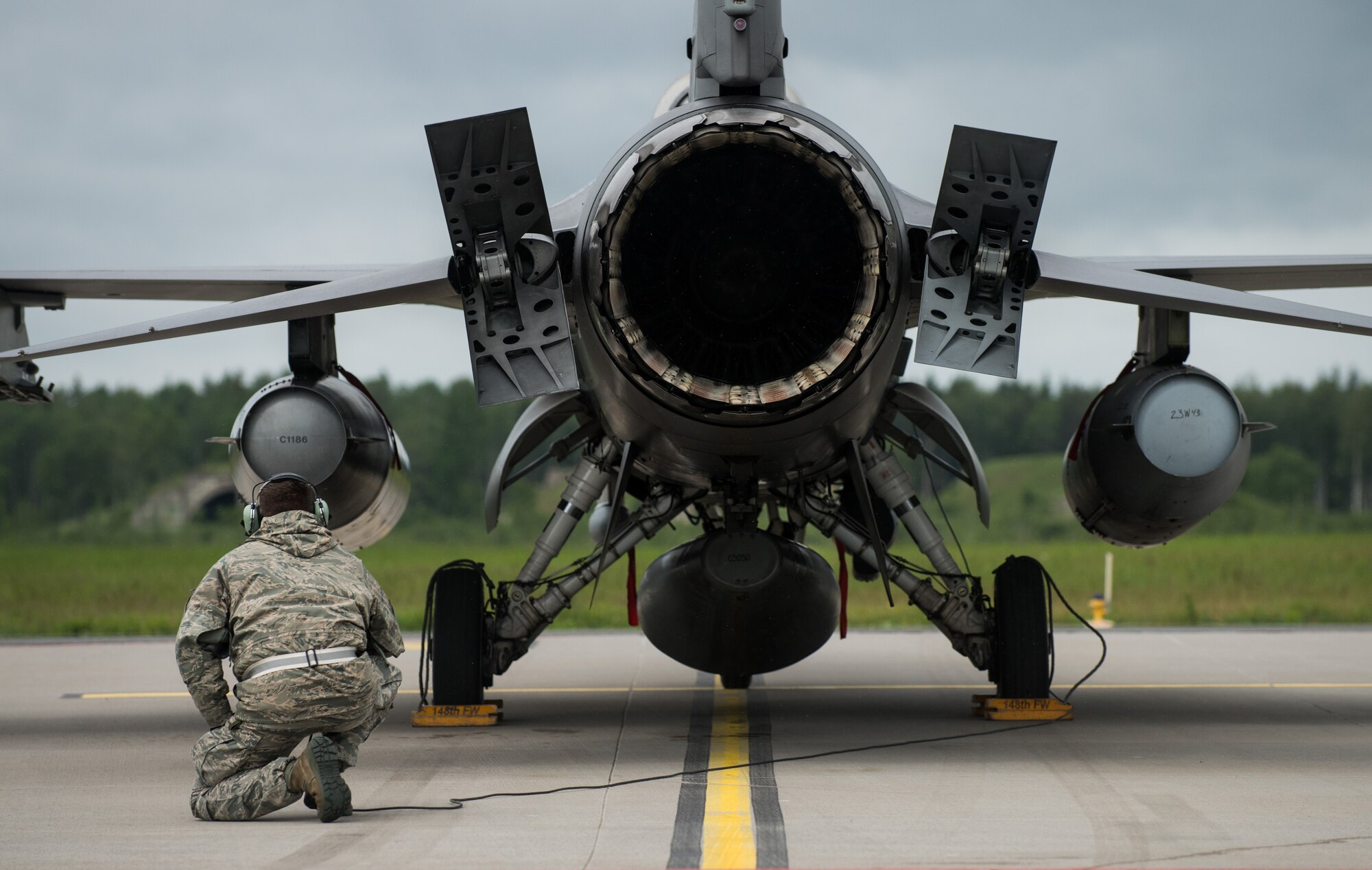 U.S. Air National Guard Tech. Sgt. Steven Larson, 148th Fighter Wing crew chief, performs pre-flight inspections with the pilot on an F-16 Falcon at ?mari Air Base, Estonia, June 13, 2014, in support of various exercises being conducted in the Baltic region including Saber Strike and Baltic Operations. Participants of Saber Strike and Baltops exercise, create and sustain existing partnerships, as well as share knowledge and skill sets to strengthen capabilities of both individual services and the international force. (U.S. Air Force photo/Senior Airman Jonathan Stefanko)