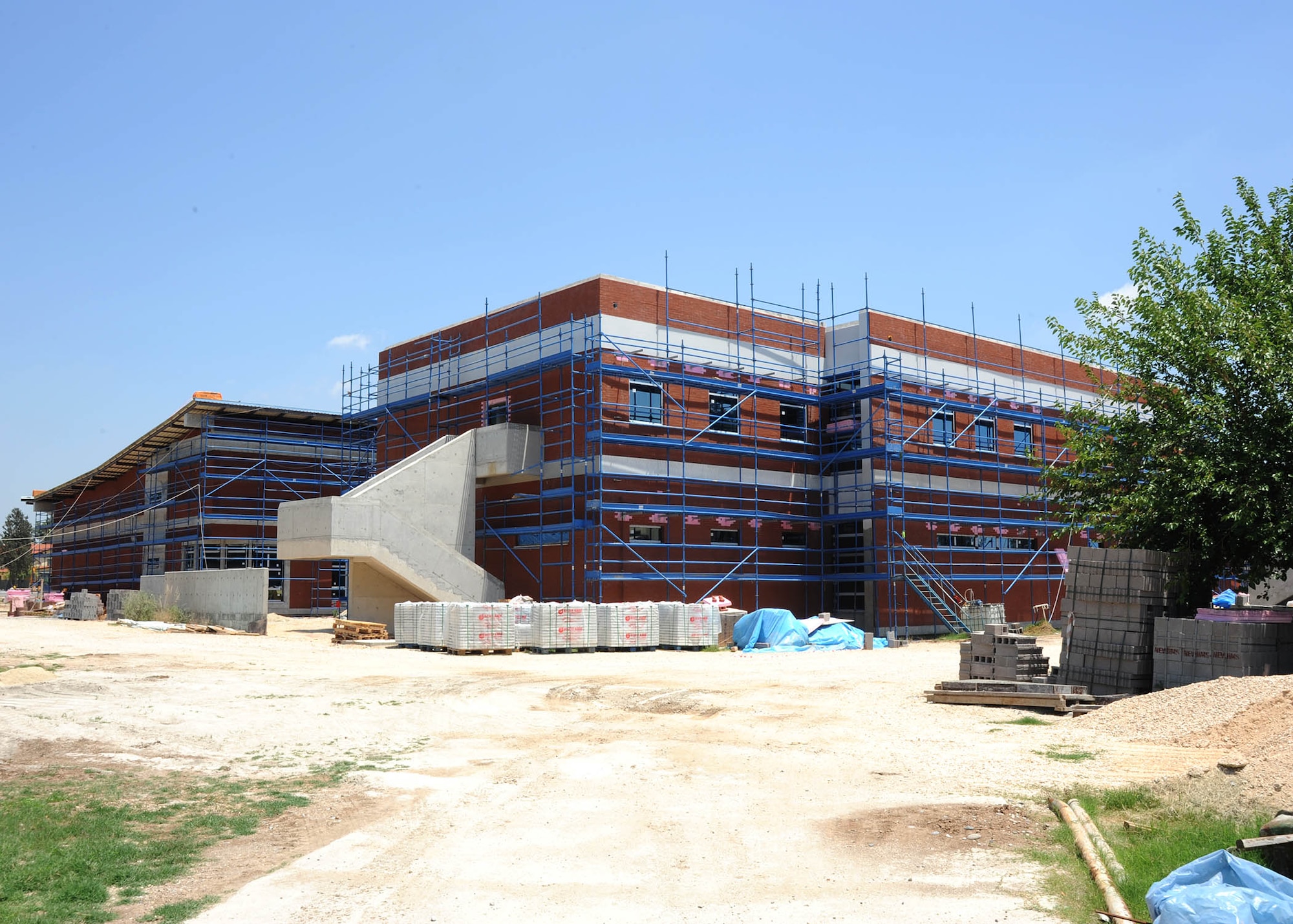 Construction on the Consolidated Community Center continues June 17, 2014, Incirlik Air Base, Turkey. The U.S. Army Corps of Engineers project is estimated to be completed fall 2014. The new facility will provide a central location for residents to utilize the services of the theater, education center, community center and library. (U.S. Air Force photo by Staff Sgt. Veronica Pierce/Released)