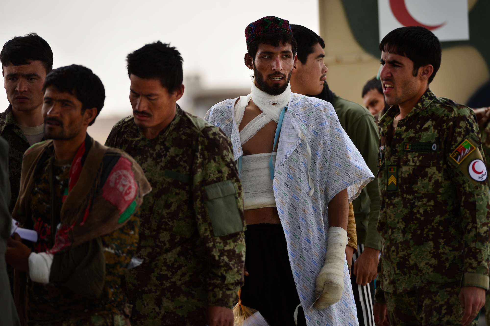 Afghan National Army soldiers prepare to board a C-130H1 Hercules during a casualty evacuation mission, Camp Bastion, Afghanistan, May 19, 2014. Sixteen injured ANA soldiers were transported to receive medical care to their injuries. (U.S. Air Force photo by Staff Sgt. Vernon Young Jr.)