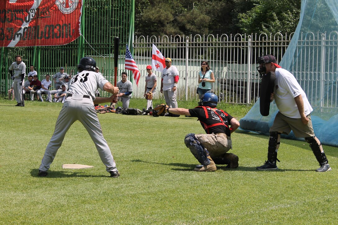 A player on the Georgian National Baseball Team prepares to swing during a May 31 baseball game at Meskhi Stadium, located in the Vake district of Tbilisi, Georgia, between the US Marines and the Georgian National Baseball Team. The game was hosted by the U.S. Embassy and the Georgian Ministry of Defense to raise awareness of the Georgian Wounded Warrior Program. The US Marines team was comprised of Marines assigned to the U.S. Embassy in Georgia and Marines assigned to the U.S. Marine Corps Forces Europe and Africa’s Georgia Deployment Program-ISAF. The Marine Forces Europe and Africa-led program has trained Georgian battalions to support ISAF missions in Afghanistan, serving alongside U.S. and other partner-nation’s forces.