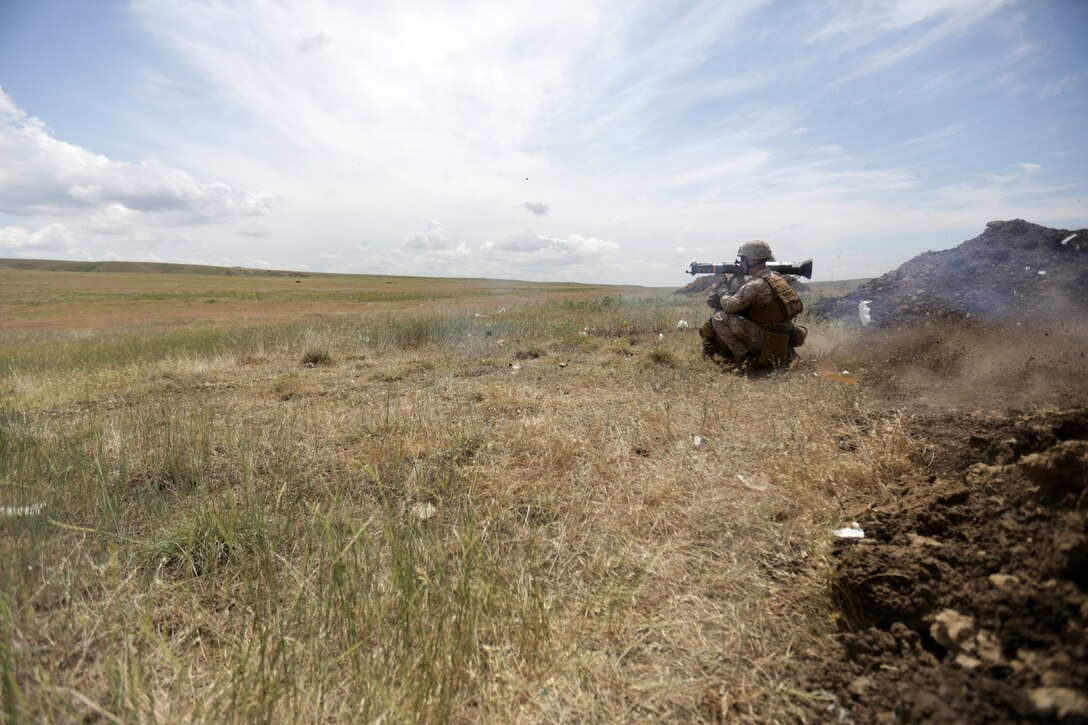 U.S. Marine Corps Lance Cpl. Kyle McNicholas of Black Sea Rotational Force 14 from 3rd Battalion, 8th Marine Regiment, fires an AT-4 light anti-armor weapon during a live-fire exercise along with Georgian soldiers during exercise Agile Spirit 14 at Vaziani Training Area, Georgia, June 11, 2014. This fourth iteration of the Agile Spirit exercise will run until 21 June, and includes live-fire training and a field exercise with both countries. The exercise is conducted with the Georgian Armed Forces within the Vaziani Training Area to increase partnership capacity and interoperability between the two nations. (U.S. Marine Corps photo by Lance Cpl. Samantha A. Barajas, 2nd Marine Division, Combat Camera/ Released)