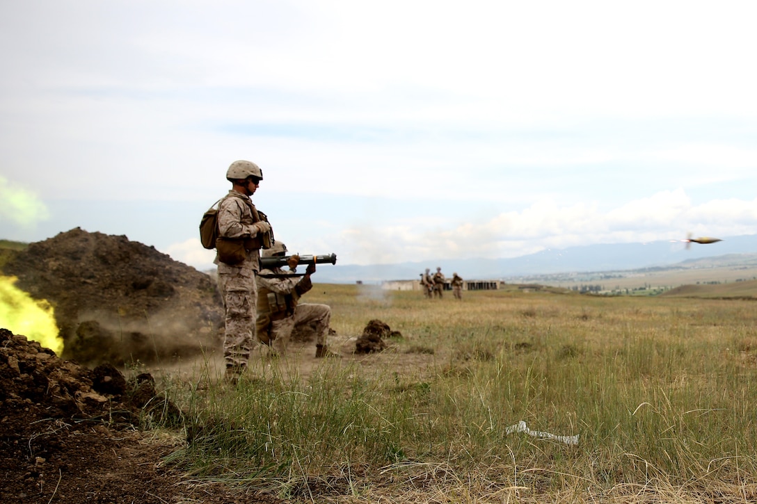 Lance Cpl. Kyle McNicholas, an infantryman with Black Sea Rotational Force 14 from 3rd Battalion, 8th Marine Regiment, fires an AT-4 light anti-armor weapon during exercise Agile Spirit aboard Vaziani Training Area, Georgia, June 11, 2014. Agile Spirit 14 is an annually-scheduled multilateral engagement hosted by Georgia that began in 2011 in order to strengthen the two countries by conducting brigade and battalion-level training engagements, to include small-unit interaction between the Marines and Georgians that demonstrates their commitments toward collective, global security. (Official Marine Corps motion imagery by Lance Cpl. Scott W. Whiting, BSRF PAO/ Released)