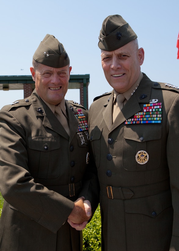 The Assistant Commandant of the Marine Corps, Gen. John M. Paxton, Jr., right, poses for a photo with the 2nd Marine Special Operations Battalion Commander, Maj. Gen. Mark A. Clark, at Marine Corps Air Station New River, NC, June 17, 2014. (U.S. Marine Corps photo by Cpl. Tia Dufour/Released)