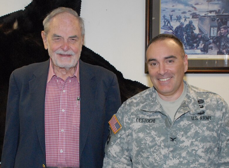 Retired Col. Amos Mathews is one of 26 soldiers to have served as the Alaska District commander during the 68-year history of the organization. His image is displayed among a group of leaders that are now pillars of Corps engineering history in Alaska. An ecstatic Col. Christopher Lestochi, the current district commander, hosted Mathews during a visit to the headquarters building at Joint Base Elmendorf-Richardson June 9.