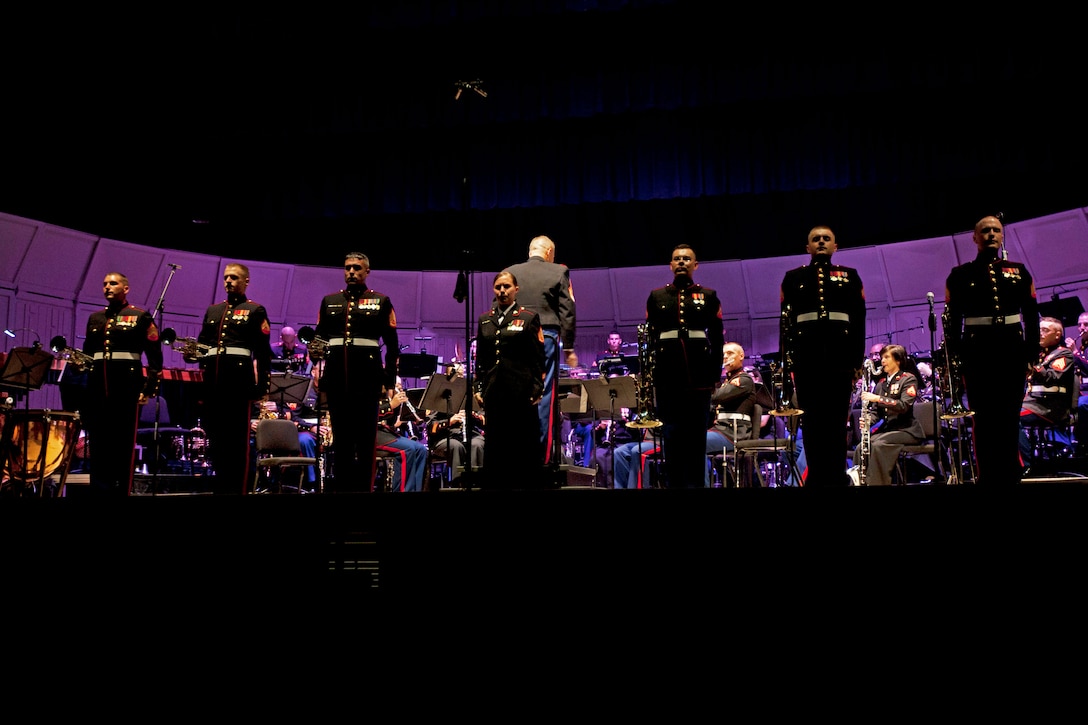 U.S. Marines with 2D Marine Aircraft Wing Band, Marine Wing Headquarters 2, perform a concert on Marine Corps Air Station Cherry Point, N.C., June 10, 2014. The concert was open to all service members and their families. (U.S. Marine Corps photo by Cpl. Ashley E. Beckett/Released)
