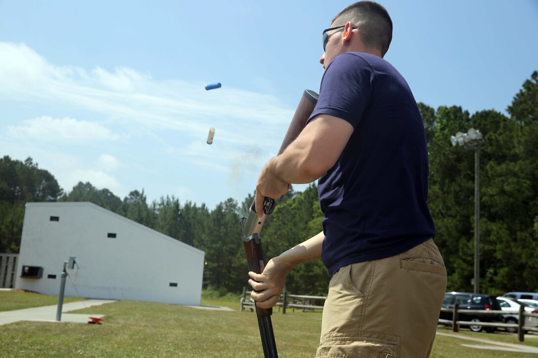 Sgt. Kristoffer Roberts unloads shotgun shells at the Marine Corps Air Station Cherry Point Skeet Range, June 5, 2014. Roberts is the training noncommissioned officer of Marine Wing Communications Squadron 28. The Marines of MWCS-28 utilized the range has as an opportunity to build unit cohesion in a relaxed environment.