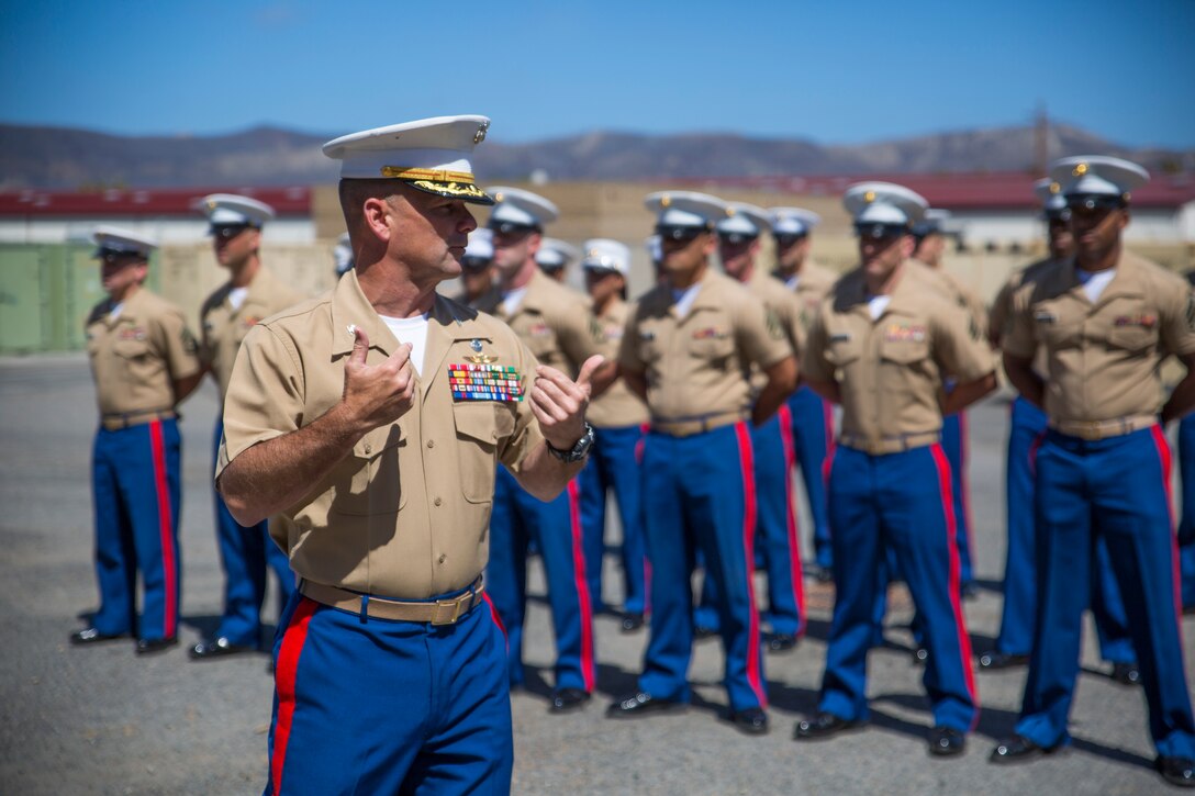 U.S. Marine Corps Col. Eric C. Hastings, commanding officer, 12th Marine Corps District, speaks to Marines during a ceremony aboard Camp Pendleton, Calif., June 17, 2014. Hastings was attending the Prior Service Recruiting change of command ceremony where Maj. Jason R. Fenton relinquished command to Maj. Brad Burnett. (U.S. Marine Corps photo by Cpl. Catie Massey, 12th Marine Corps District/Released)