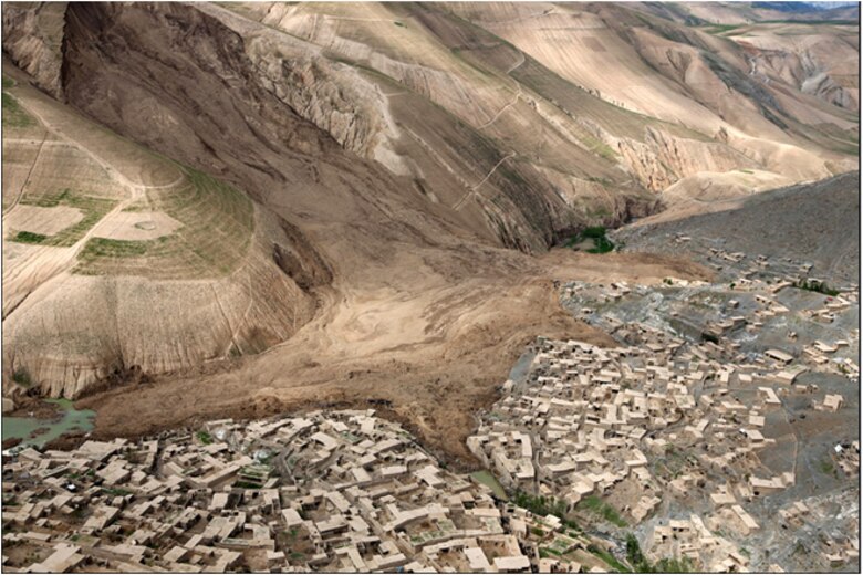 The photo depicts the landslide with the town in the
foreground. The river is shown backing up in the left part of the picture.
