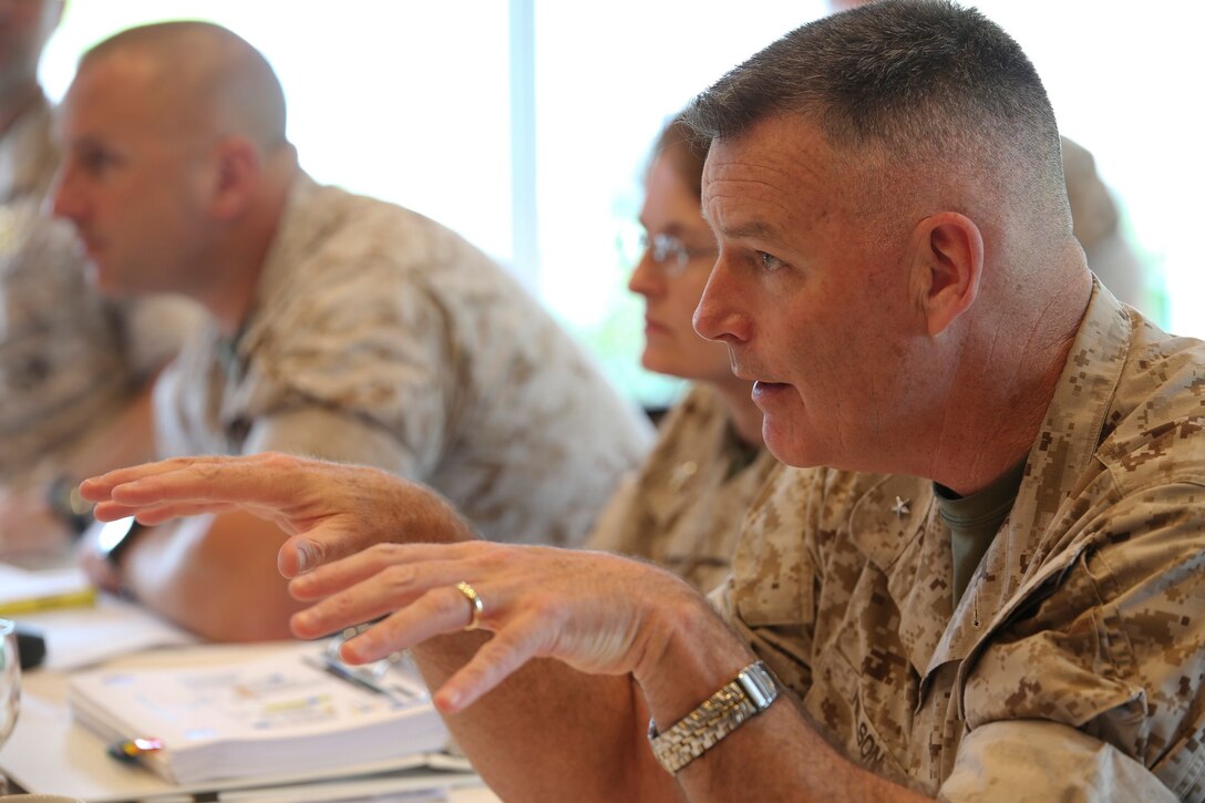Brig. Gen. Niel E. Nelson gives opening remarks June 10 during a two-day commander’s conference at the Surfside on Camp Kinser. The conference brought together 3rd Marine Logistics Group subordinate command unit leaders from duty stations across the Asia-Pacific region, including Okinawa, mainland Japan and Hawaii, to discuss numerous topics. Nelson, a Genoa, Nevada native, is the commanding general of 3rd MLG, III Marine Expeditionary Force. (U.S. Marine Corps photo by Lance Cpl. Brittany A. James/ Released)