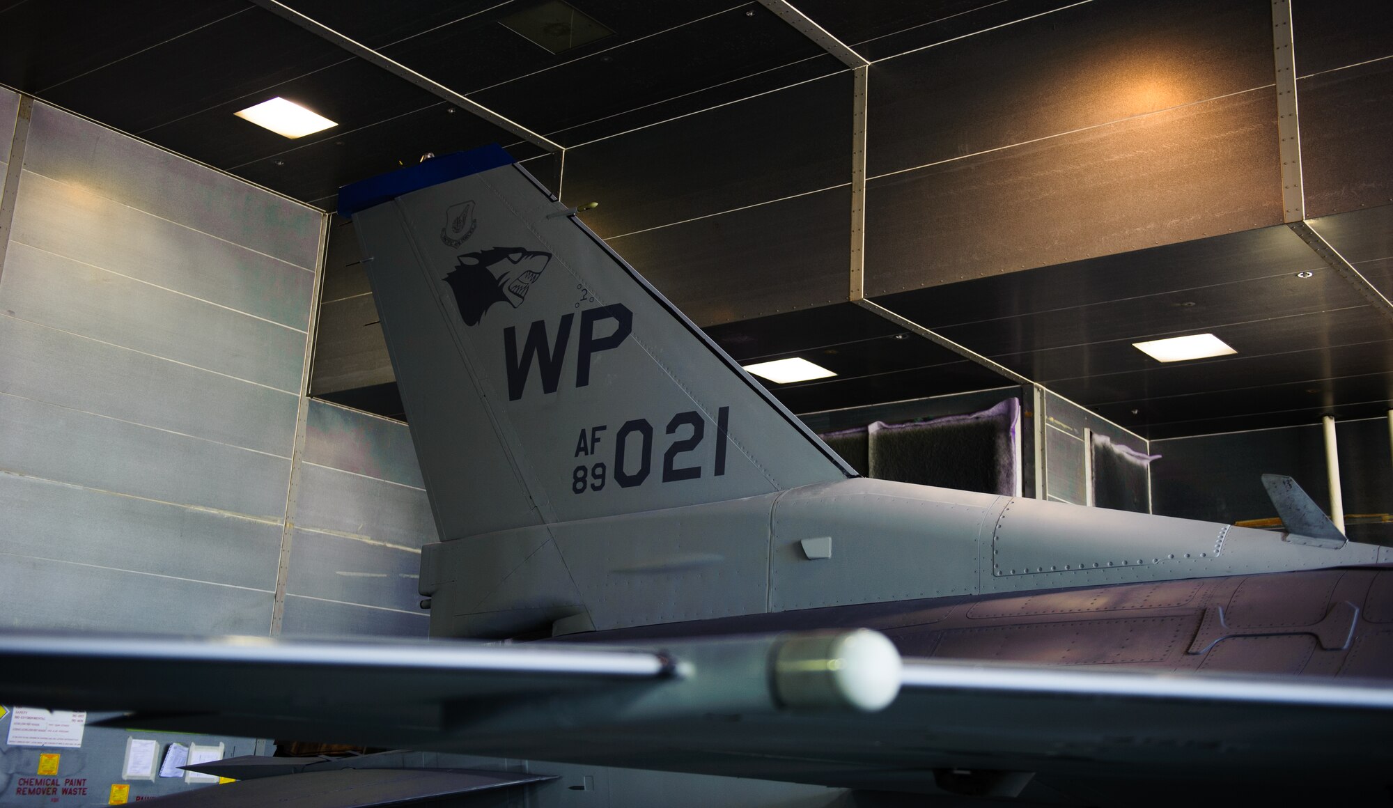 After 10 days of work, the tail of a freshly painted F-16 Fighting Falcon is ready to head back to the flight line at Kunsan Air Base, Republic of Korea, June 16, 2014. Six Airmen from the 8th Maintenance Squadron corrosion control section worked on the first full-scale paint job in six years at Kunsan after a recent upgrade to the painting facility. (U.S. Air Force photo by Senior Airman Armando A. Schwier-Morales/Released)