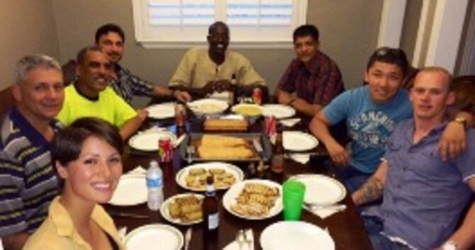 2nd Lt. Anna-Marie Wyant hosts dinner at her home for military officers from Hawaii, Mauritania, Pakistan, Burundi, Nepal, Kazakhstan and Estonia June 5, 2014. (courtesy photo)