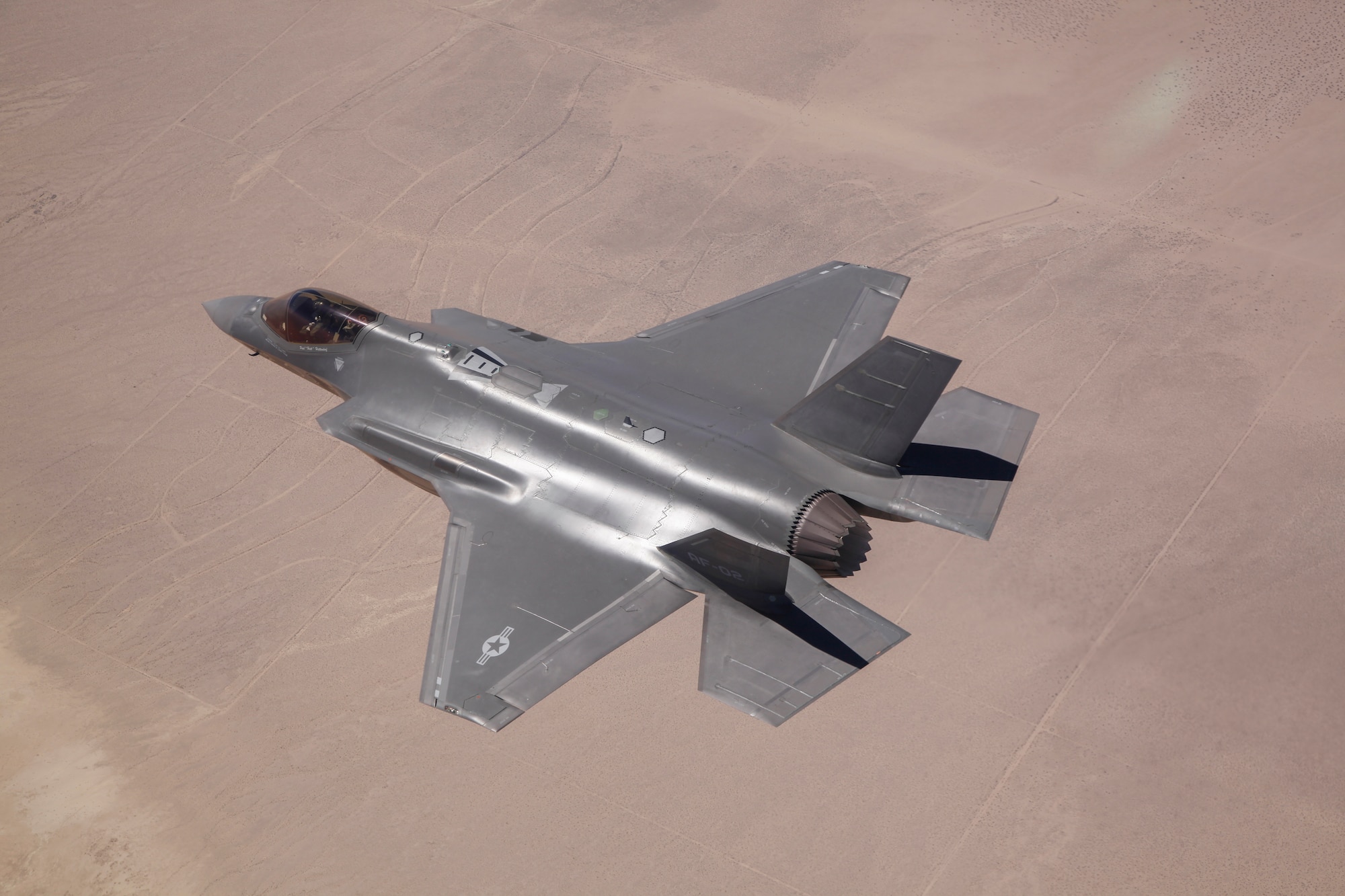 Paul Hattendorf, Lockheed Martin test pilot, flies AF-2 over Edwards during an Airframe Loads Envelope Expansion mission June 11. On this test mission, AF-2 reached 1,000 flying hours becoming the first F-35 to do so. (Photo courtesy of Tom Reynolds/ Lockheed Martin)
