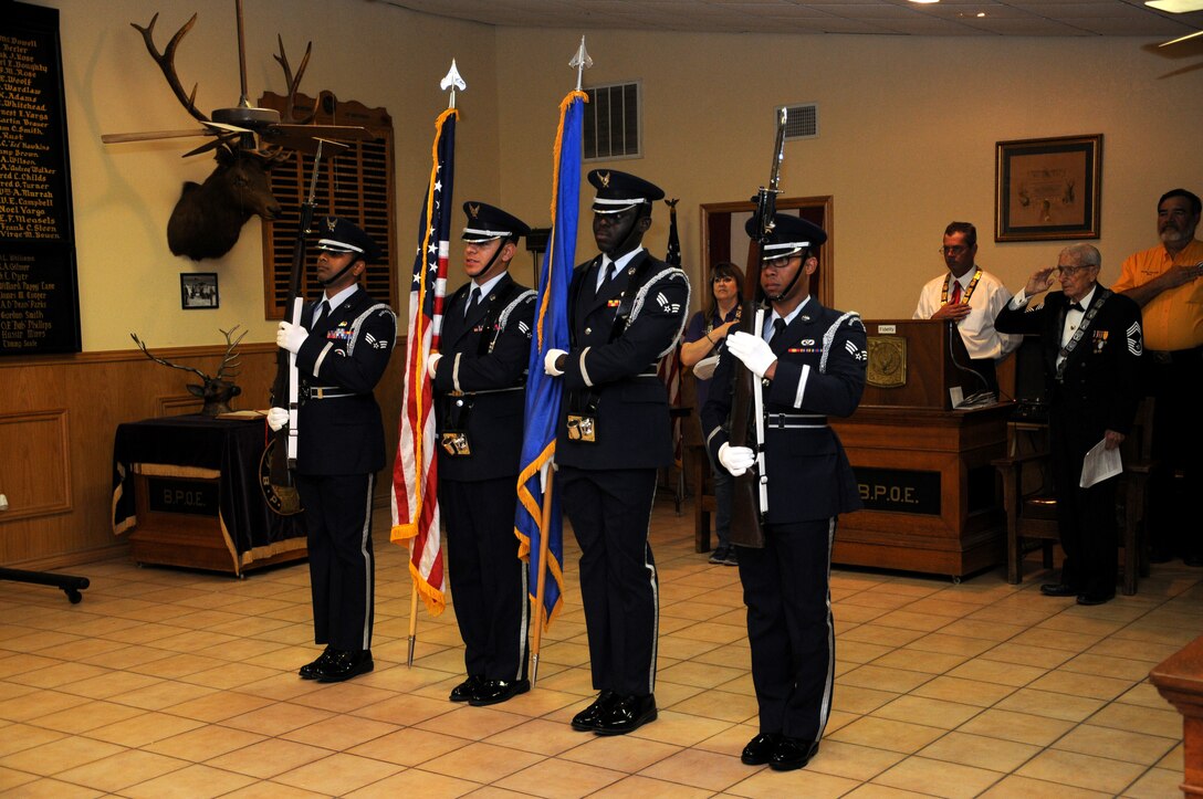 From left, Senior Airman Pradeep Muddasani, Senior Airman Jesse Garcia Villanueva, Senior Airman Evens Perjuste, and Senior Airman Mark Anthony Concepcion, members of the 47th Flying Training Wing’s Honor Guard, guard the colors at a Flag Day ceremony at the Benevolent and Protective Order of the Elks lodge in Del Rio, Texas, June 14, 2014. America celebrates Flag Day June 14, which is the day the Second Continental Congress adopted the nation’s flag in 1777. (U.S. Air Force Photo by Senior Airman Nathan Maysonet, 47th Flying Training Wing.) (Released)