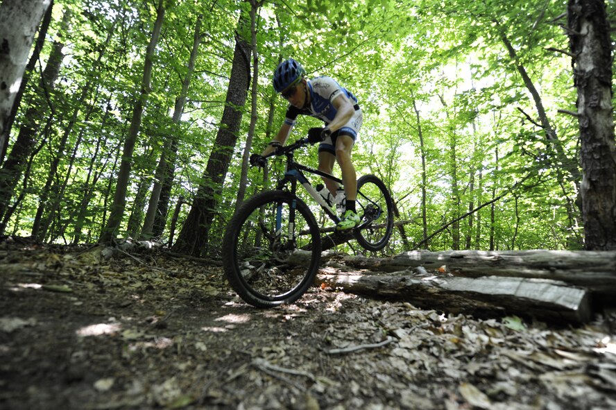 Senior Airman David Flaten, 811th Security Forces Squadron protective services member and professional cross-country mountain biker, trains at Rosaryville State Park, Md., June 3, 2014. Flaten is ranked 43rd of 250 according to USA Cycling, the official cycling organization responsible for identifying, training and selecting cyclists to represent the United States in international competition. (U.S. Air Force photo/ Senior Airman Nesha Humes)