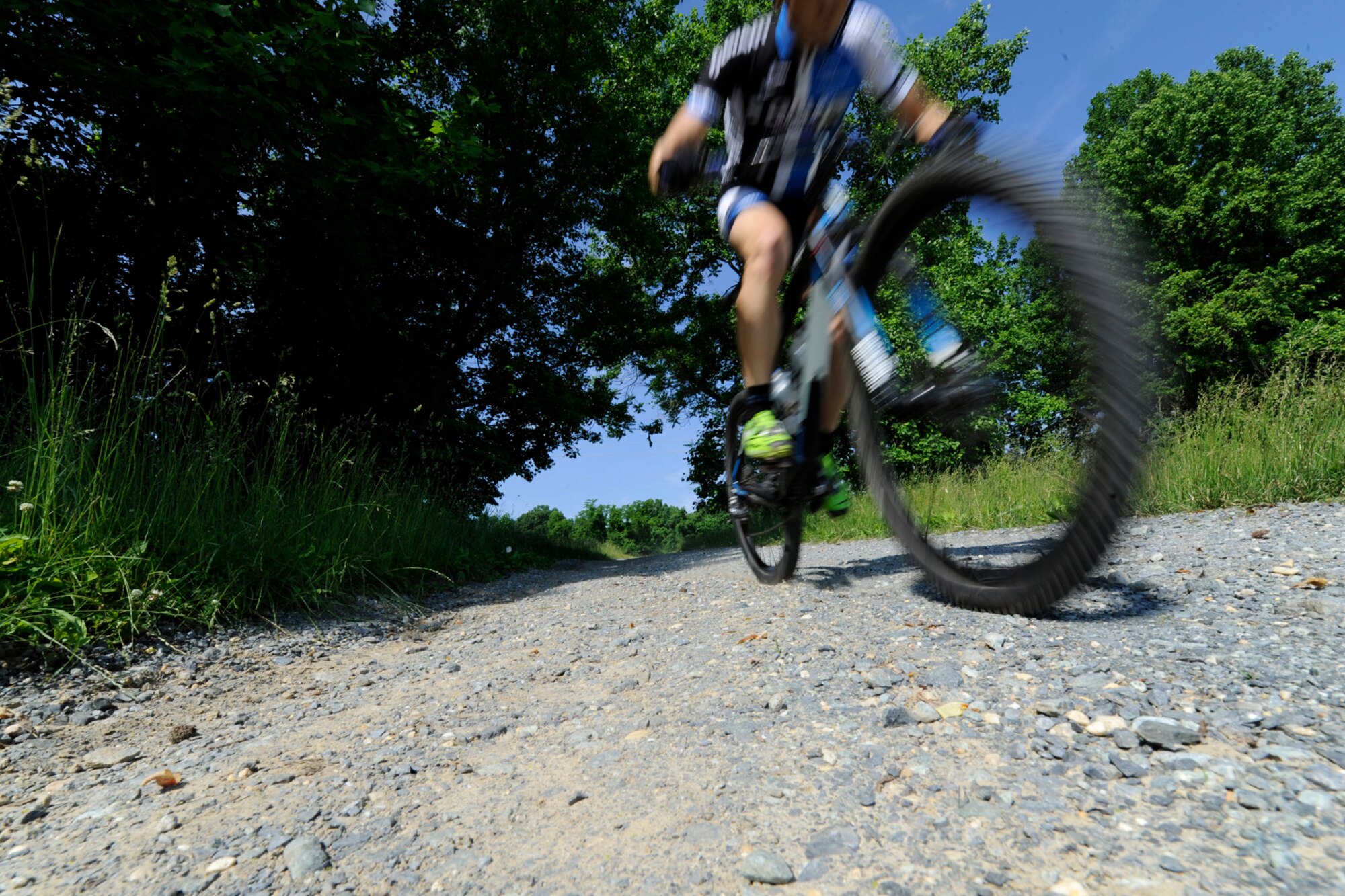 Senior Airman David Flaten, 811th Security Forces Squadron protective services member and professional cross-country mountain biker, trains at Rosaryville State Park, Md., June 3, 2014. Flaten is ranked 43rd of 250 according to USA Cycling, the official cycling organization responsible for identifying, training and selecting cyclists to represent the United States in international competition. (U.S. Air Force photo/ Senior Airman Nesha Humes)