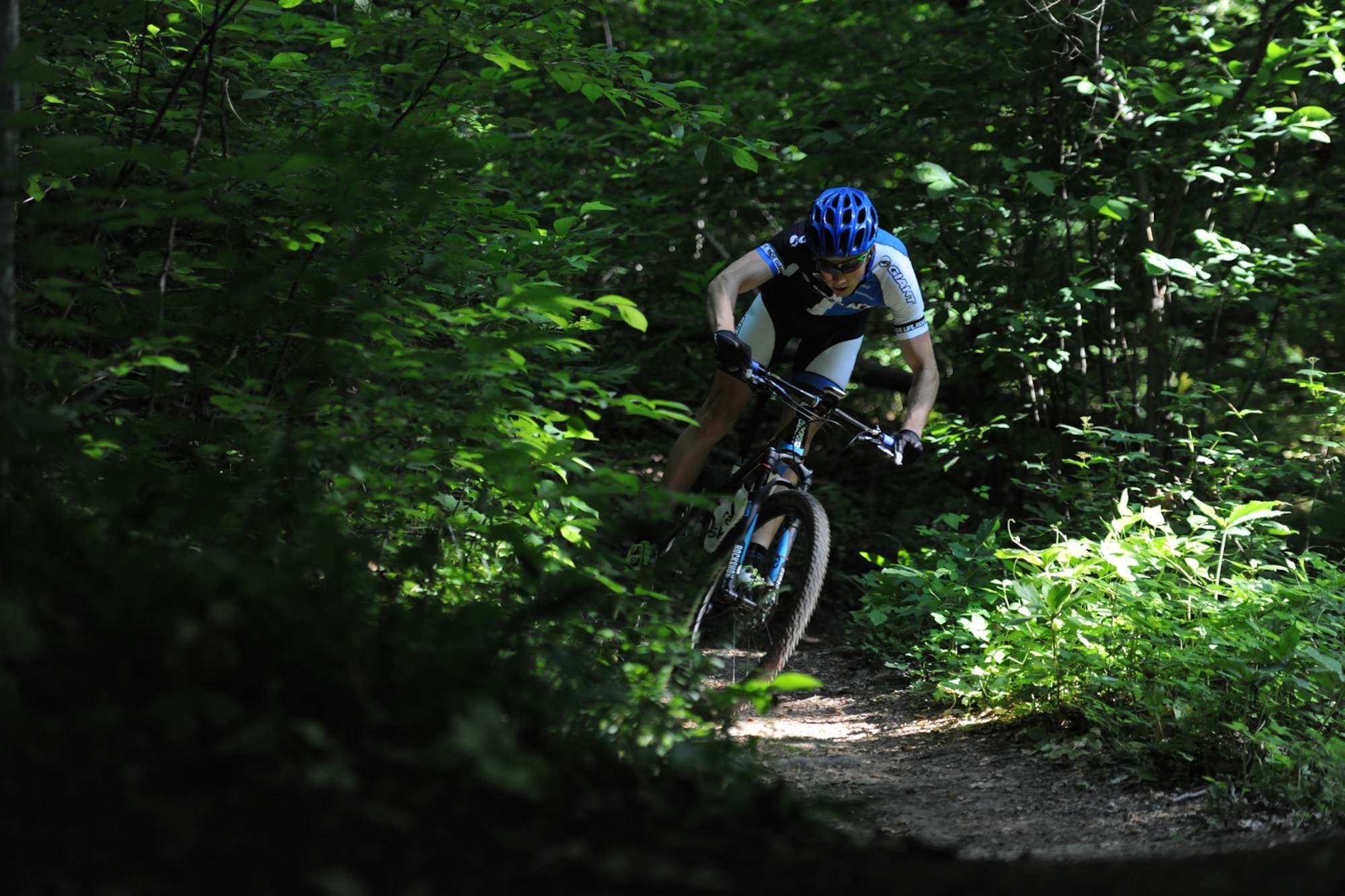 Senior Airman David Flaten, 811th Security Forces Squadron protective services member and professional cross-country mountain biker, trains at Rosaryville State Park, Md., June 3, 2014. Flaten is ranked 43rd of 250 according to USA Cycling, the official cycling organization responsible for identifying, training and selecting cyclists to represent the United States in international competition. (U.S. Air Force photo/ Senior Airman Nesha Humes)