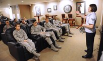 Airman 1st Class Abi Mello, Airman’s Dorm Council president, speaks to Airmen attending a council meeting May 28 at the Joint Base San Antonio-Randolph unaccompanied dorm theater room. (U.S. Air Force photo by Melissa Peterson)