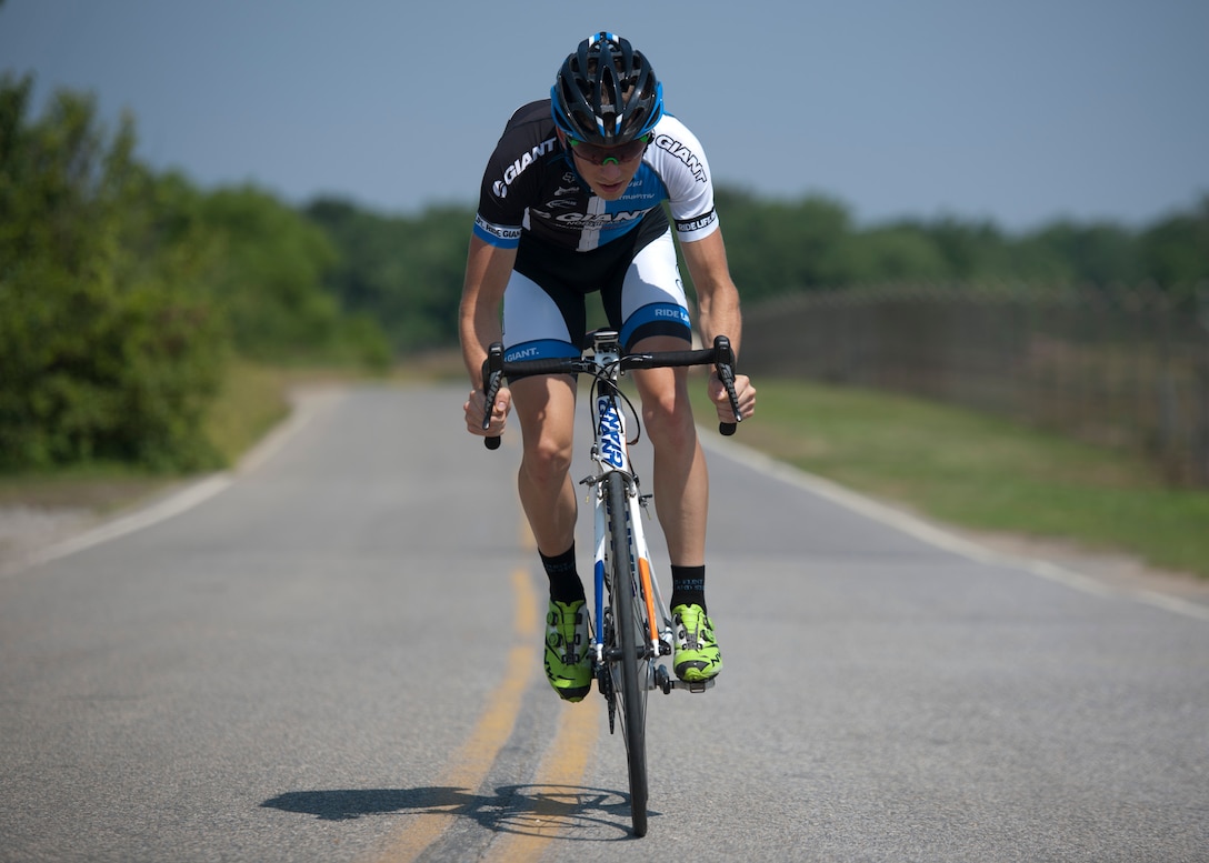 Senior Airman David Flaten, 811th Security Forces Squadron protective services member and professional cross-country mountain biker, trains at Joint Base Andrews, Md., June 18, 2014. Flaten is ranked 43rd of 250 according to USA Cycling, the official cycling organization responsible for identifying, training and selecting cyclists to represent the United States in international competition. (U.S. Air Force photo/ Senior Airman Nesha Humes)