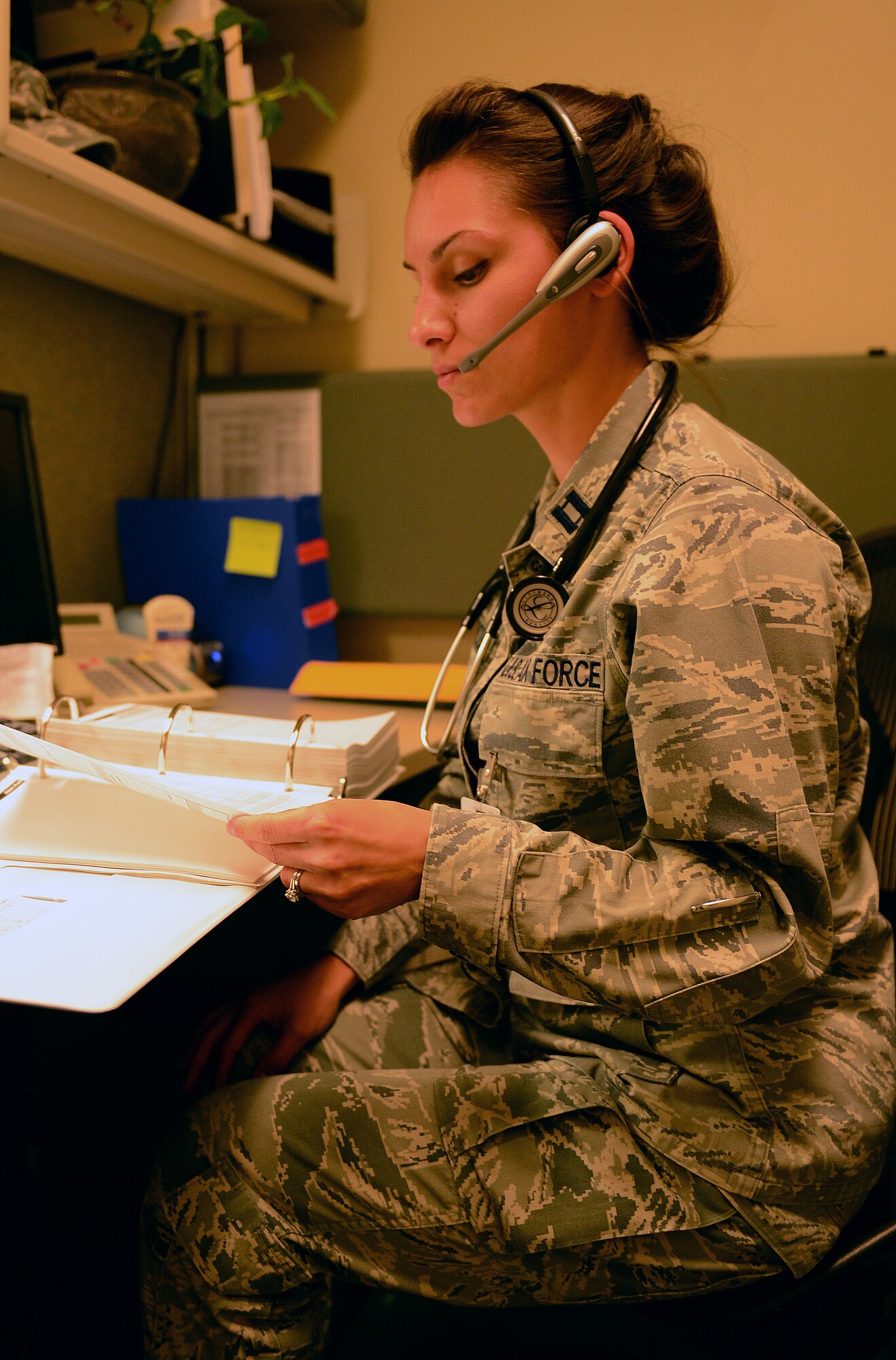 Capt. Anna Garcia, 62nd Medical Squadron clinical nurse, schedules an appointment for a patient using the new Nurse Advice Line at the McChord Field Airmen’s Clinic June 17, 2014, at Joint Base Lewis-McChord, Wash. The NAL is a new system designed to help reduce non-emergency visits to the emergency room and urgent care through providing patients with over-the-phone care. (U.S. Air Force photo/Senior Airmen Brenden Marlin)