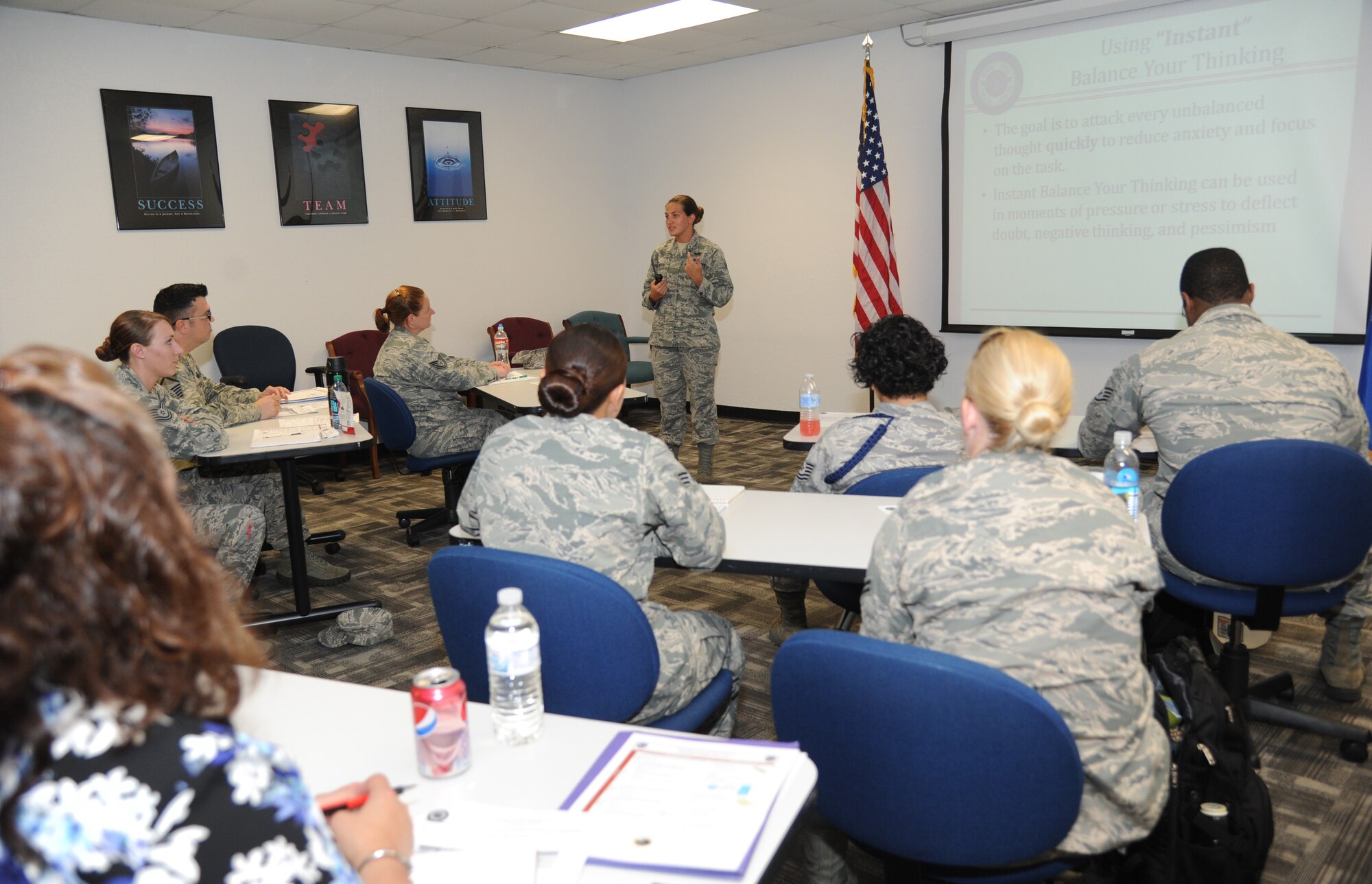 Staff Sgt. Heather Smith, 345th Airlift Squadron and master resiliency trainer, briefs on the subject, balance your thinking, during the resiliency training assistant course June 17, 2014, at the Airman Leadership building, Keesler Air Force Base, Miss.  The 3-day course held June 17-19 is an extension of comprehensive Airman Fitness which is taught and reinforced base-wide by master resiliency trainers and their resiliency training assistants. (U.S. Air Force photo by Kemberly Groue)
