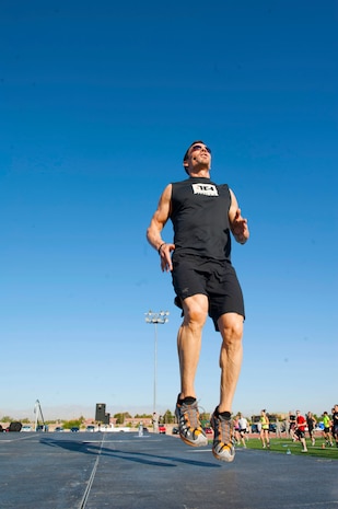 Tony Horton, P90X workout creator, inspires the Nellis community members during a Warrior Trained Fitness session at the Warrior Fitness Center June 17, 2014, Nellis Air Force Base, Nev. Horton came to Nellis to conduct a workout session and provide a motivational speech to inspire members to stay physically fit. (U.S. Air Force photo by Airman 1st class Rachel Loftis) 