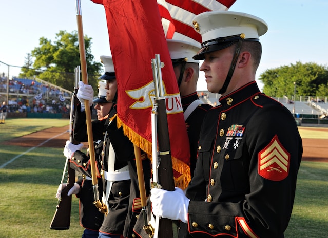A U.S. Marine Corps Color Guard from Yuba City, Calif., presents the colors during the opening ceremony for the Marysville Gold Sox military appreciation game June 14, 2014, at the Appeal Democrat Park in Marysville, Calif. (U.S. Air Force photo by Airman 1st Class Ramon A. Adelan/ released)