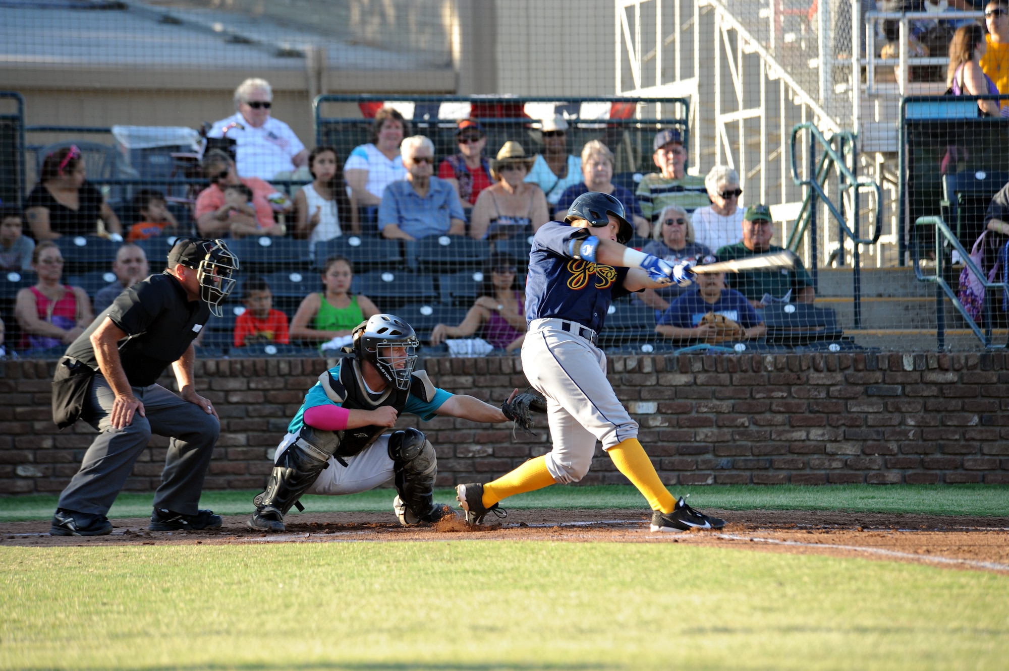 Spencer Draws, an Air Force Academy cadet and Marysville Gold Sox third baseman, hits the ball June 14, 2014, against the Atwater Aviators at the Appeal Democrat Park in Marysville, Calif. Draws will be playing on the Gold Sox for the summer. (U.S. Air Force photo by Airman 1st Class Ramon A. Adelan/ released)
