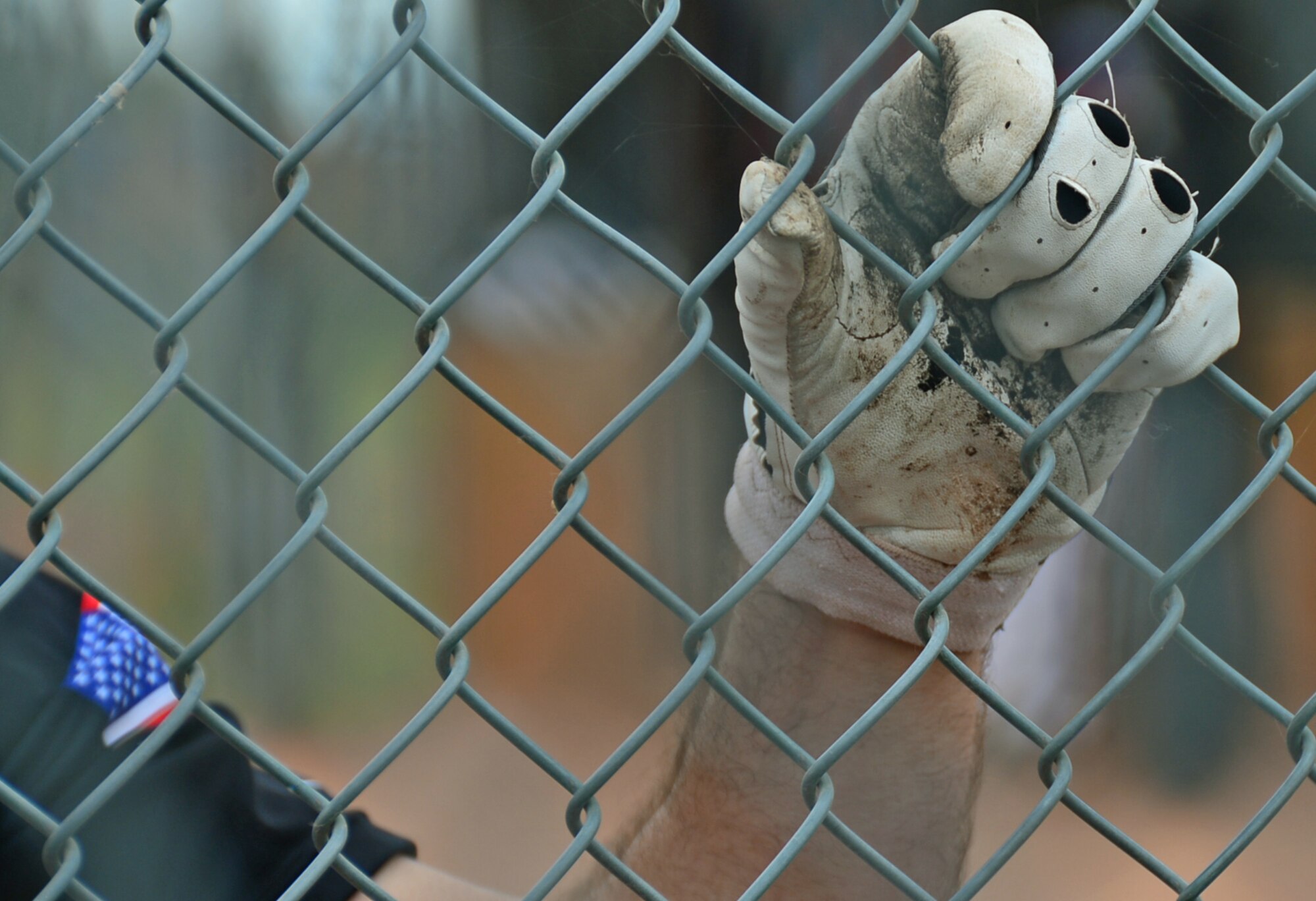 A Royal Air Force Lakenheath teammate observes the 3rd Annual U.S. Air Forces in Europe Softball Tournament held here, June 15, 2014. (U.S. Air Force photo by Airman 1st Class Erin O’Shea/Released)