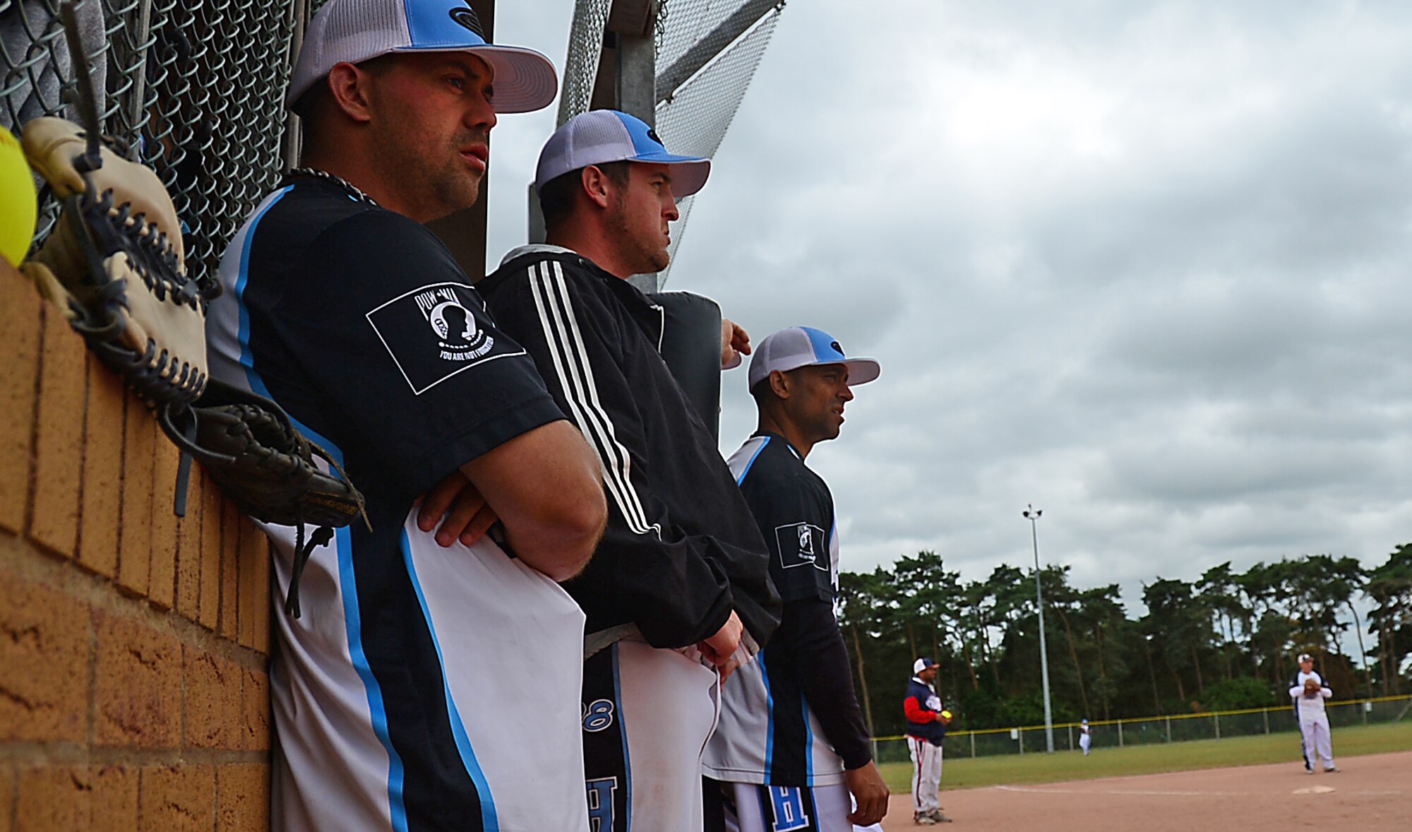 Royal Air Force Lakenheath teammates observe the field during a softball game against Spangdahlem Air Base during the 3rd Annual U.S. Air Forces in Europe Softball Tournament held at Royal Air Force Lakenheath, England, June 15, 2014. Once a year, USAFE bases alternate hosting the tournament supporting 10-14 softball teams from around Europe spanning over the course of a weekend. (U.S. Air Force photo by Airman 1st Class Erin O’Shea/Released)