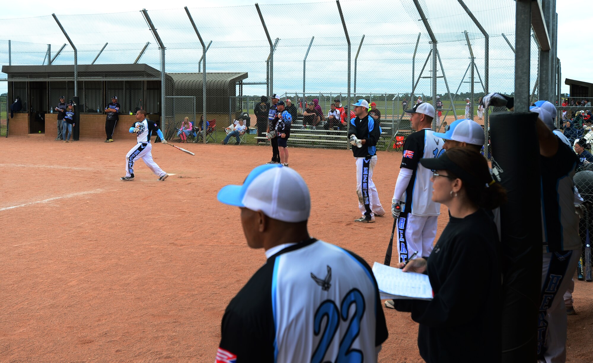 Royal Air Force Lakenheath teammates participate in a softball game against Ramstein Air Base during the 3rd Annual U.S. Air Forces in Europe Softball Tournament held here, June 15, 2014. Ramstein Air Base placed first in the tournament over RAF Lakenheath with a score of 21-20 in the final game. (U.S. Air Force photo by Airman 1st Class Erin O’Shea/Released)