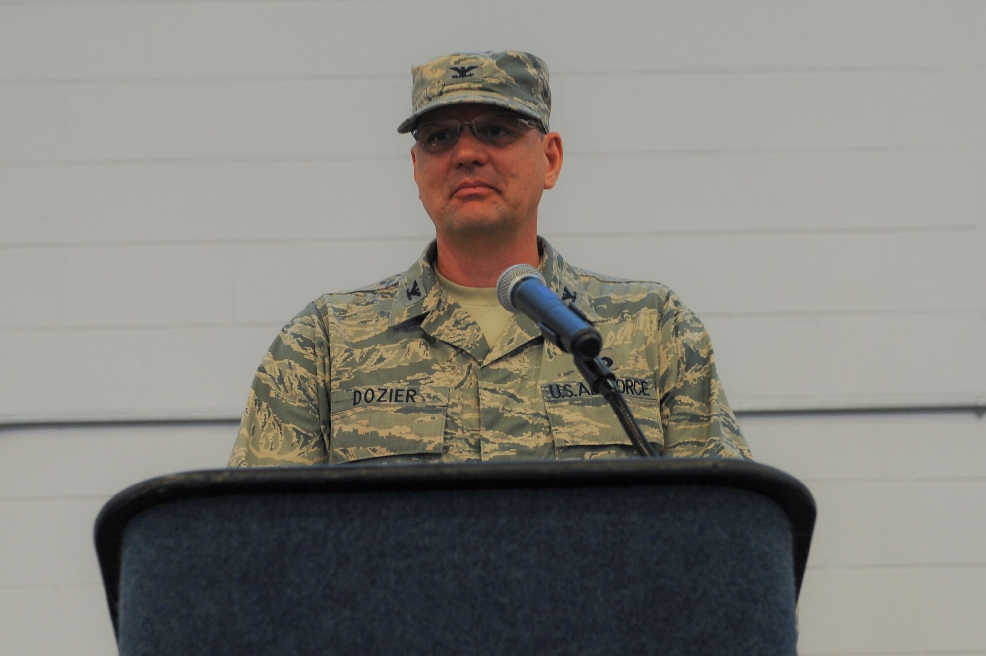U.S. Air Force Col. Norman Dozier, 23d Mission Support Group commander, thanks everyone for attending his assumption of command at Moody Air Force Base, Ga., June 18, 2014.  Dozier, his wife and two daughters joined the Flying Tiger family after their previous assignment from the Pentagon, Washington D.C. (U.S. Air Force photo by Airman 1st Class Alexis Millican/Released)