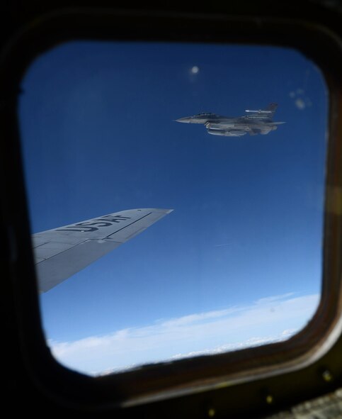 A U.S. Air Force F-16 Fighting Falcon flies beside a KC-135 Stratotanker after receiving fuel June 17, 2014, during a Baltic Operations Exercise mission over Poland. Celebrating its 42nd year, the BALTOPS Exercise aims to improve security in the Baltic Sea through cooperation among regional allies. (U.S. Air Force photo/Airman 1st Class Kyla Gifford/Released)
